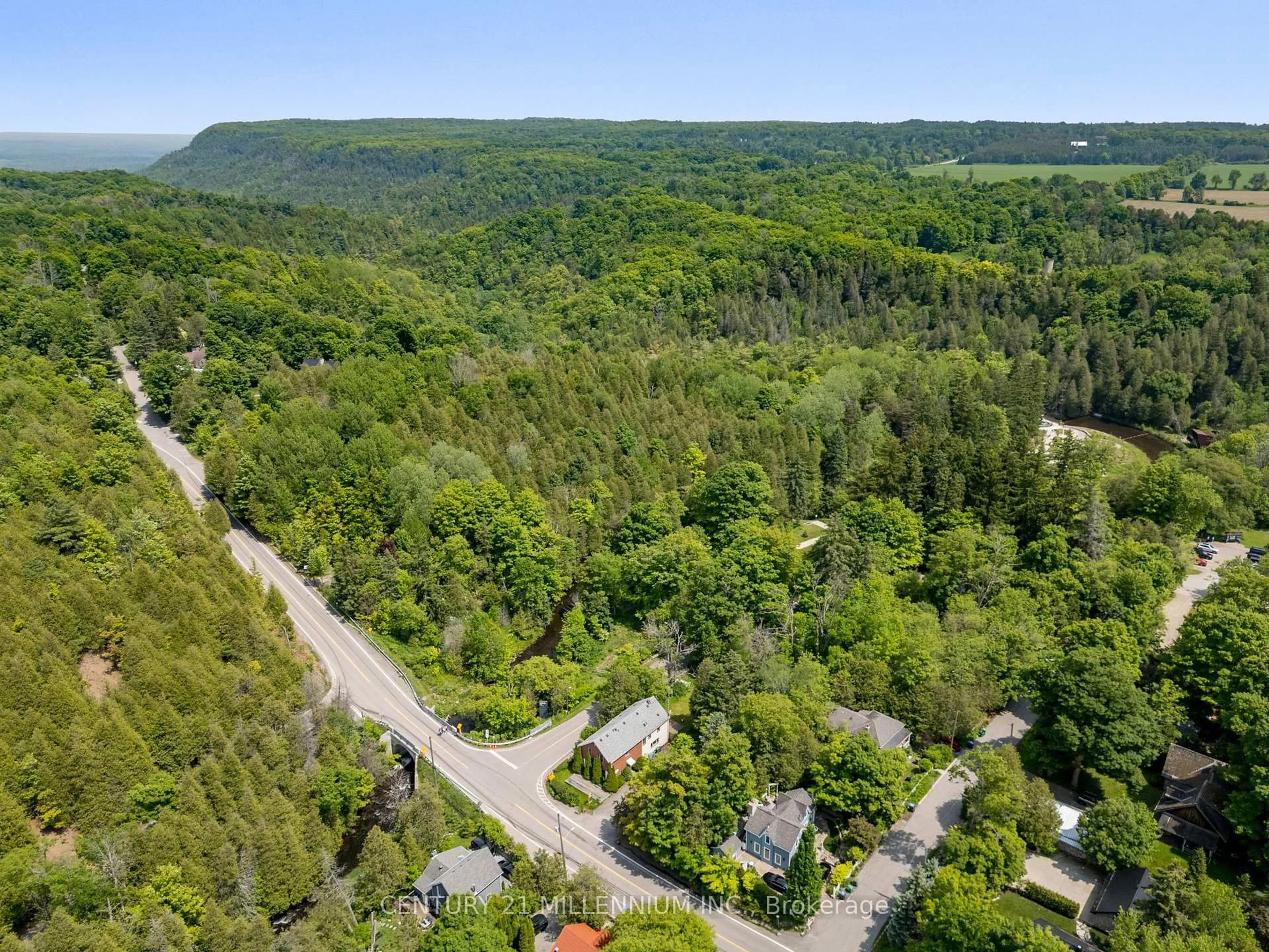 A pic from outside/outdoor area/front of a property/back of a property/a pic from drone, forest/trees view for 815 Forks Of The Credit Rd, Caledon Ontario L7K 0E7
