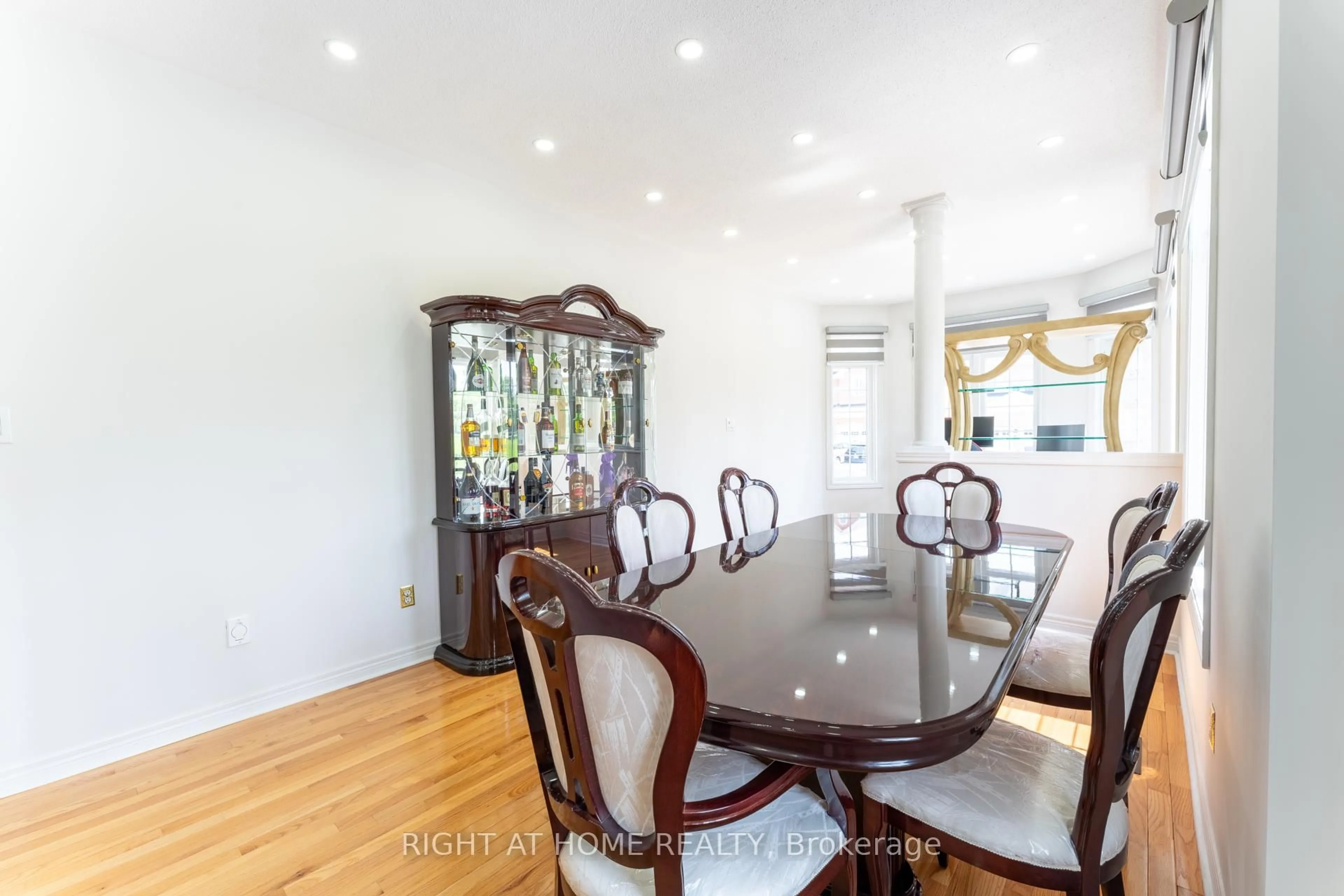 Dining room, wood/laminate floor for 15 Tournament Dr, Brampton Ontario L7A 3J9