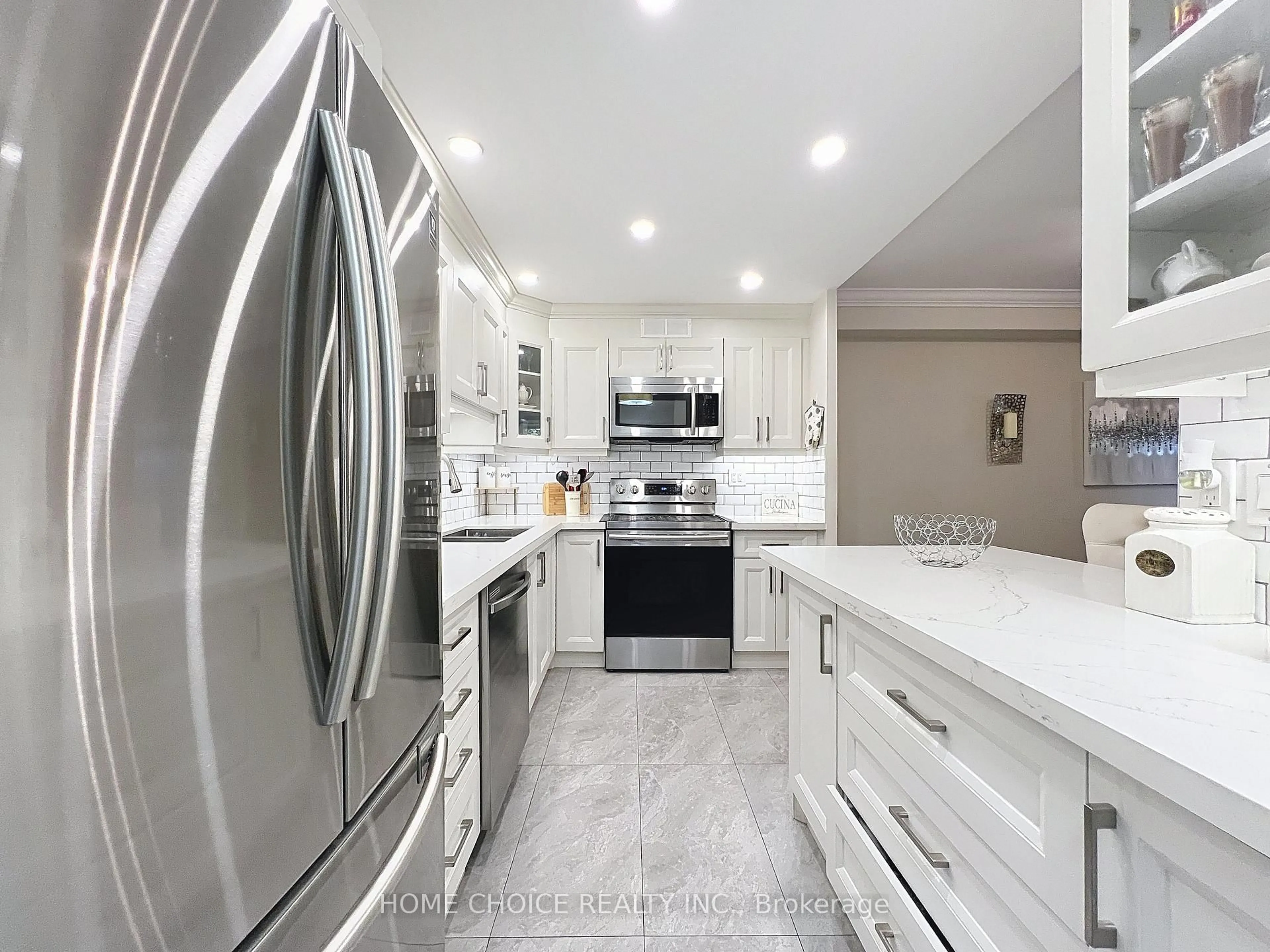 Contemporary kitchen, ceramic/tile floor for 15 La Rose Ave #114, Toronto Ontario M9P 1A7