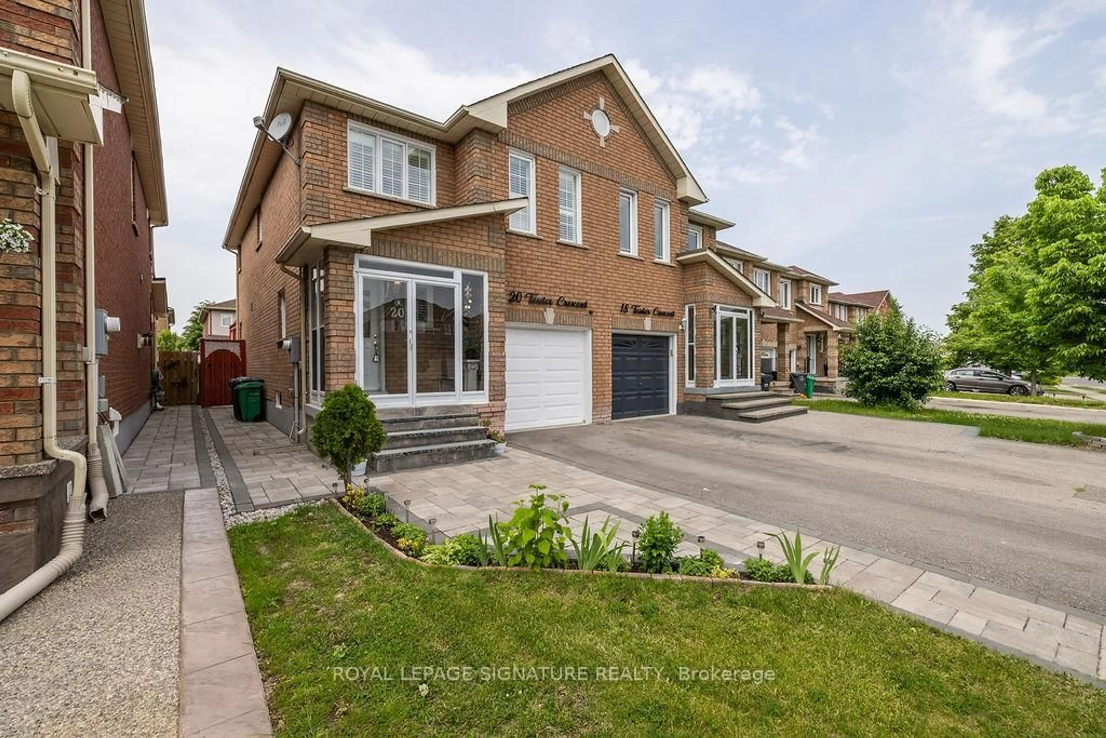 Home with brick exterior material, street for 20 Tessler Cres, Brampton Ontario L6X 4P8