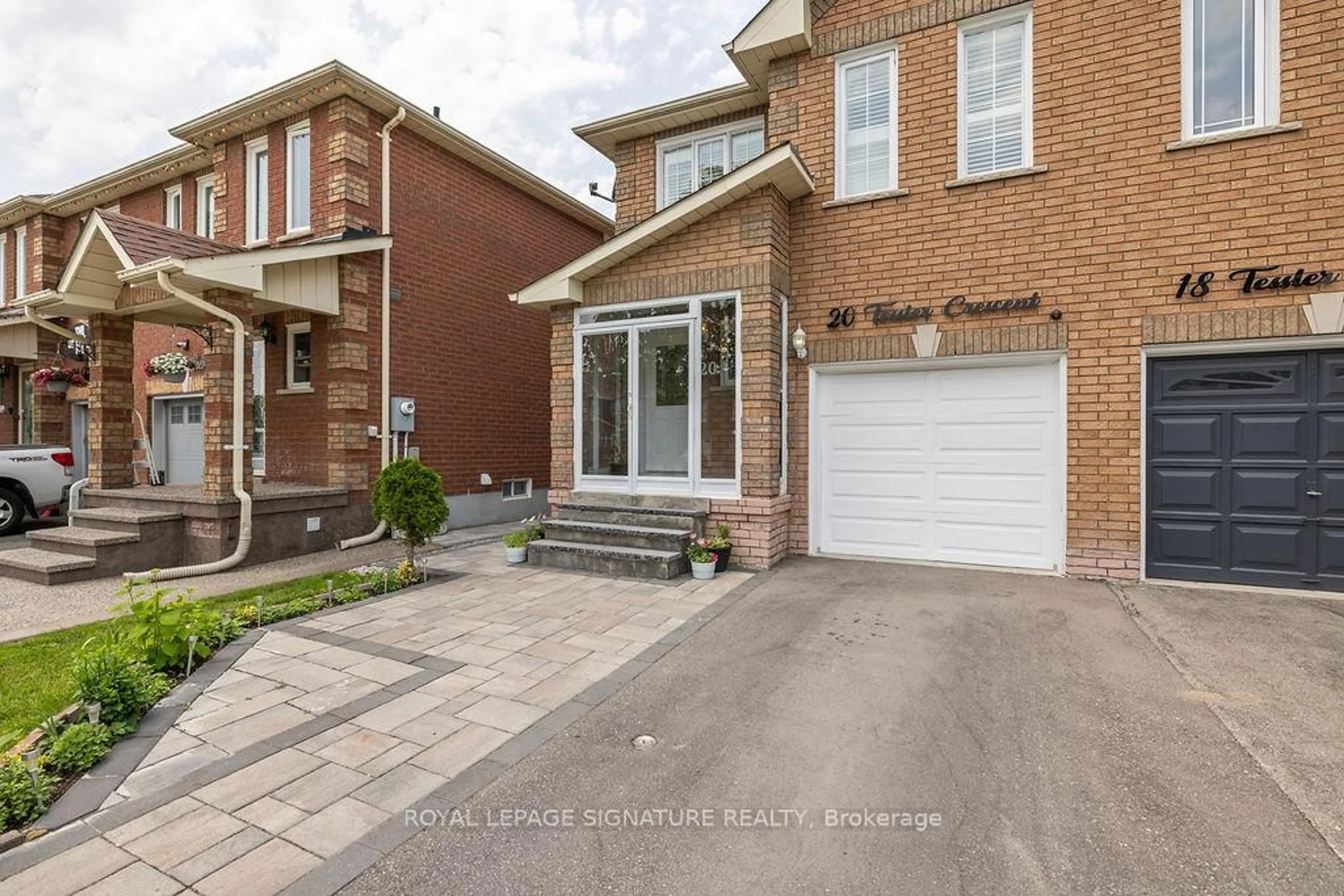 Home with brick exterior material, street for 20 Tessler Cres, Brampton Ontario L6X 4P8