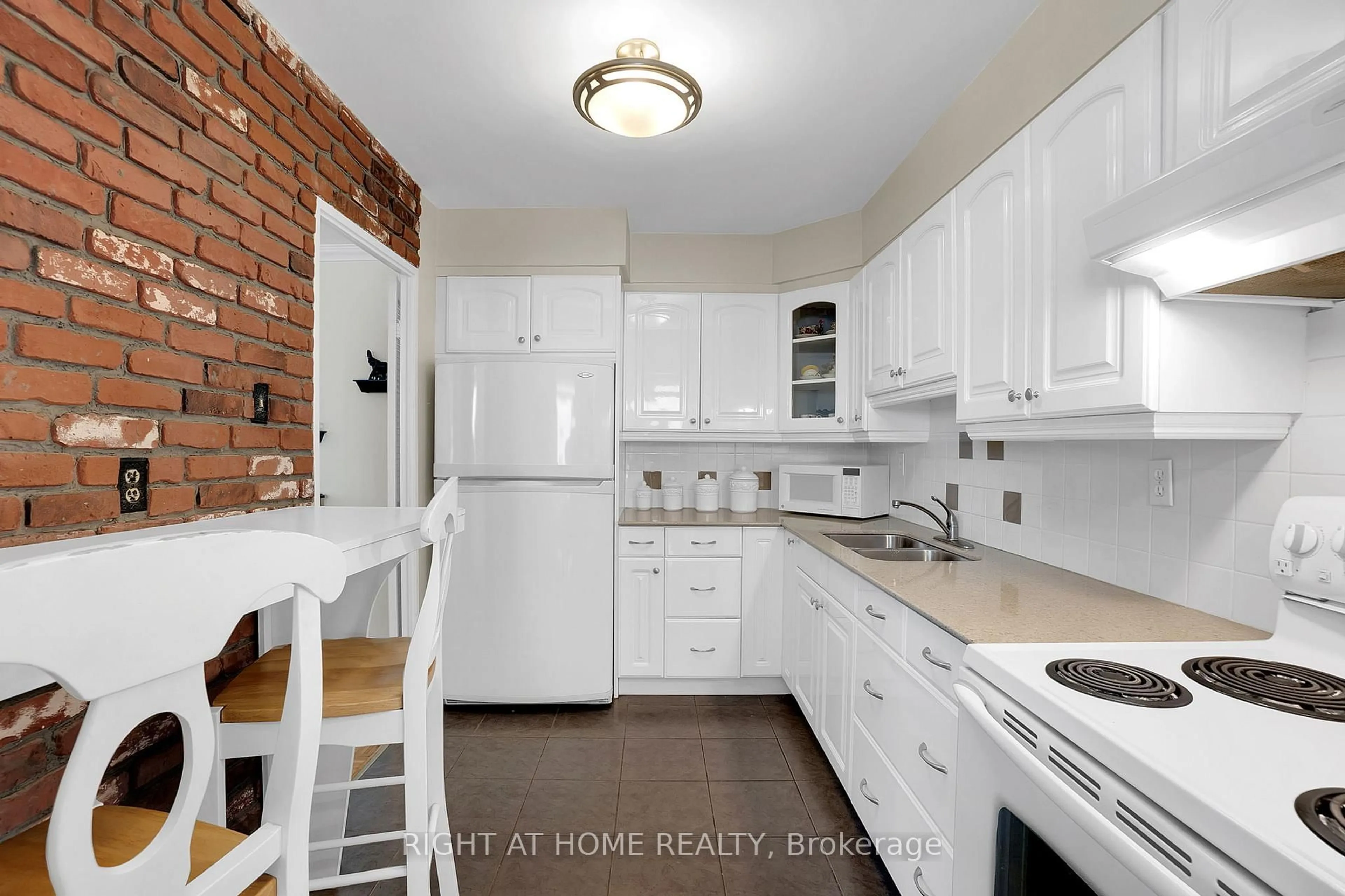 Standard kitchen, ceramic/tile floor for 360 Ridelle Ave #2101, Toronto Ontario M6B 1K1