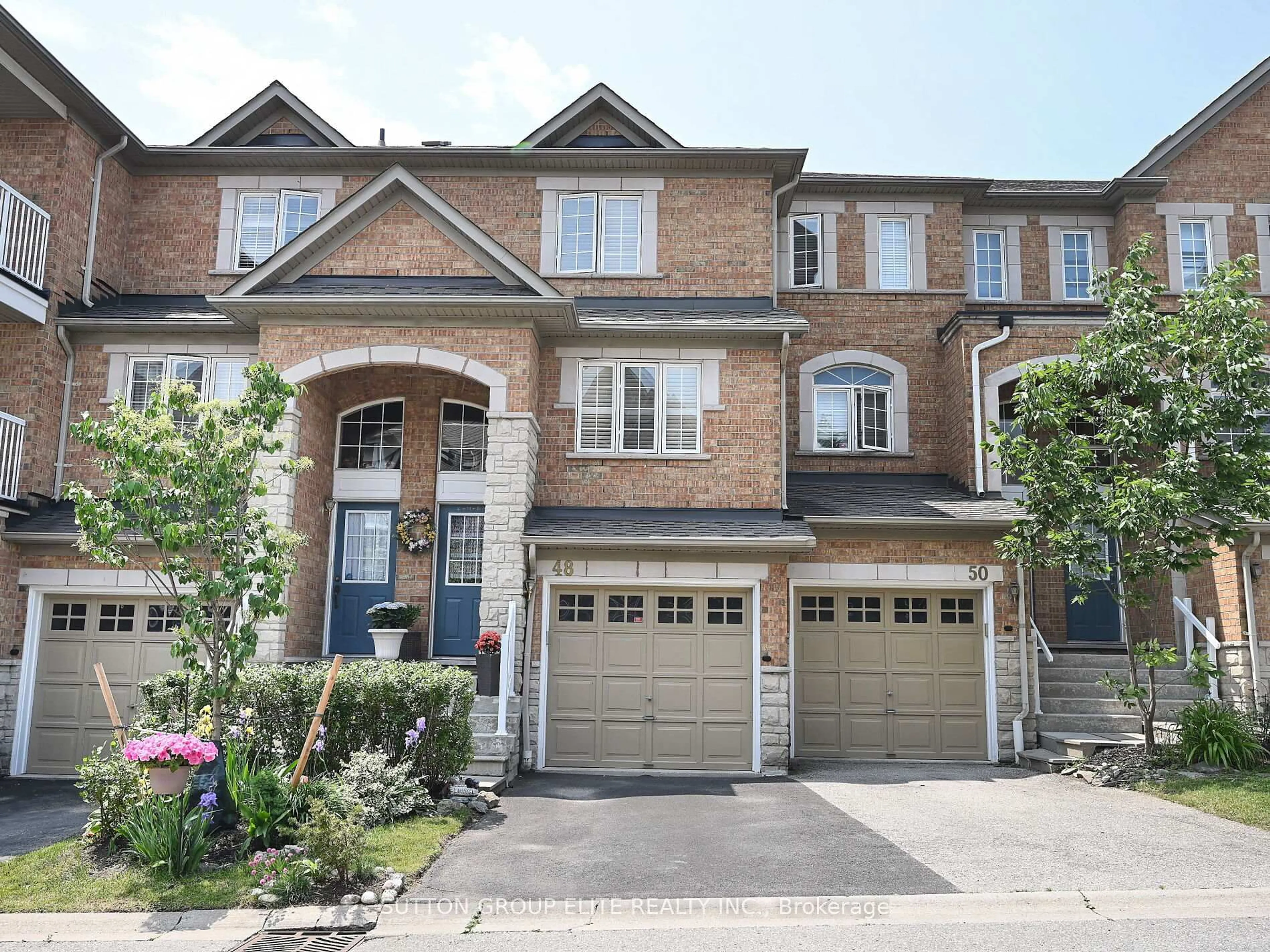 Home with brick exterior material, street for 601 Shoreline Dr #48, Mississauga Ontario L5B 4K7