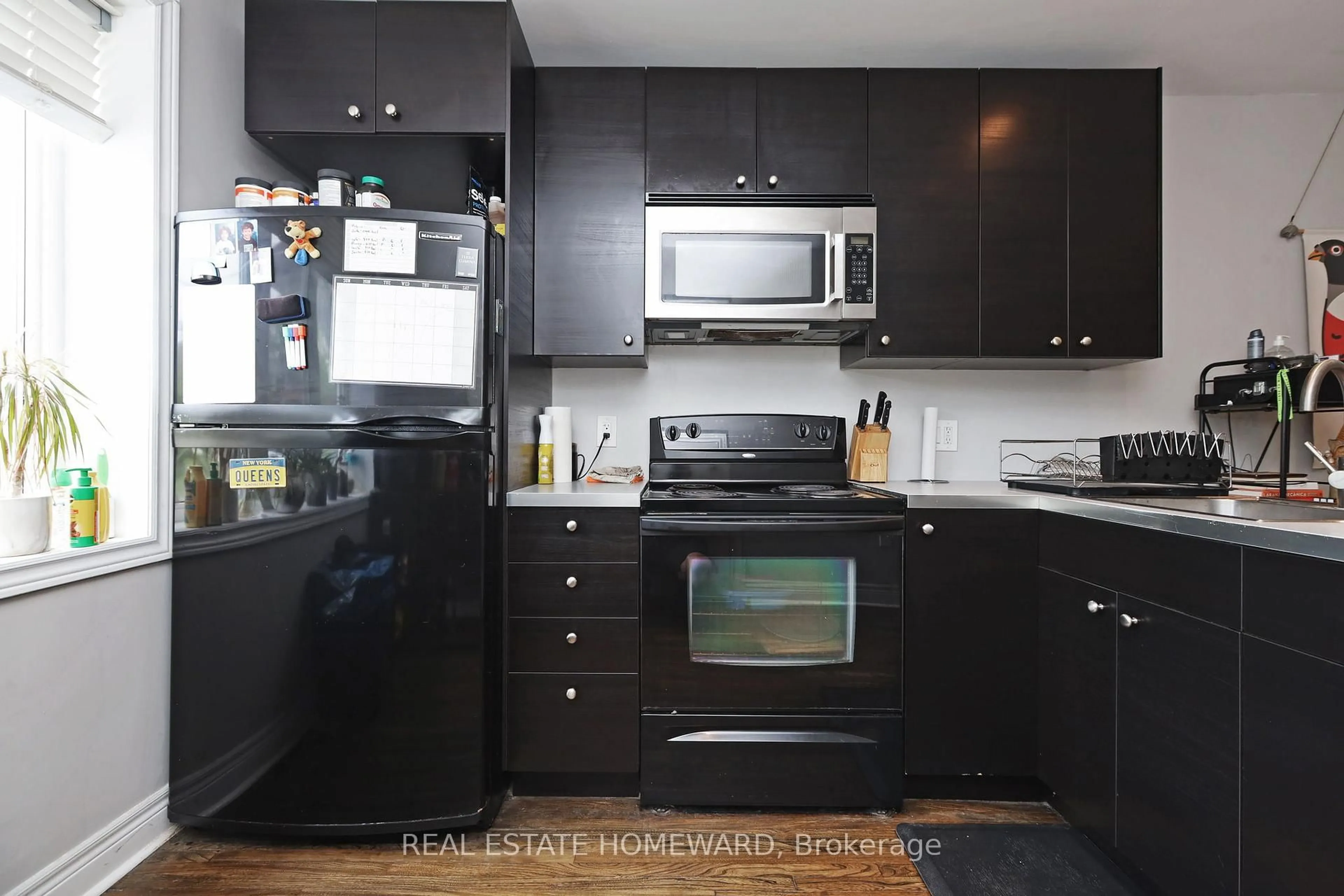 Standard kitchen, wood/laminate floor for 156 Royal York Rd, Toronto Ontario M8V 2V3