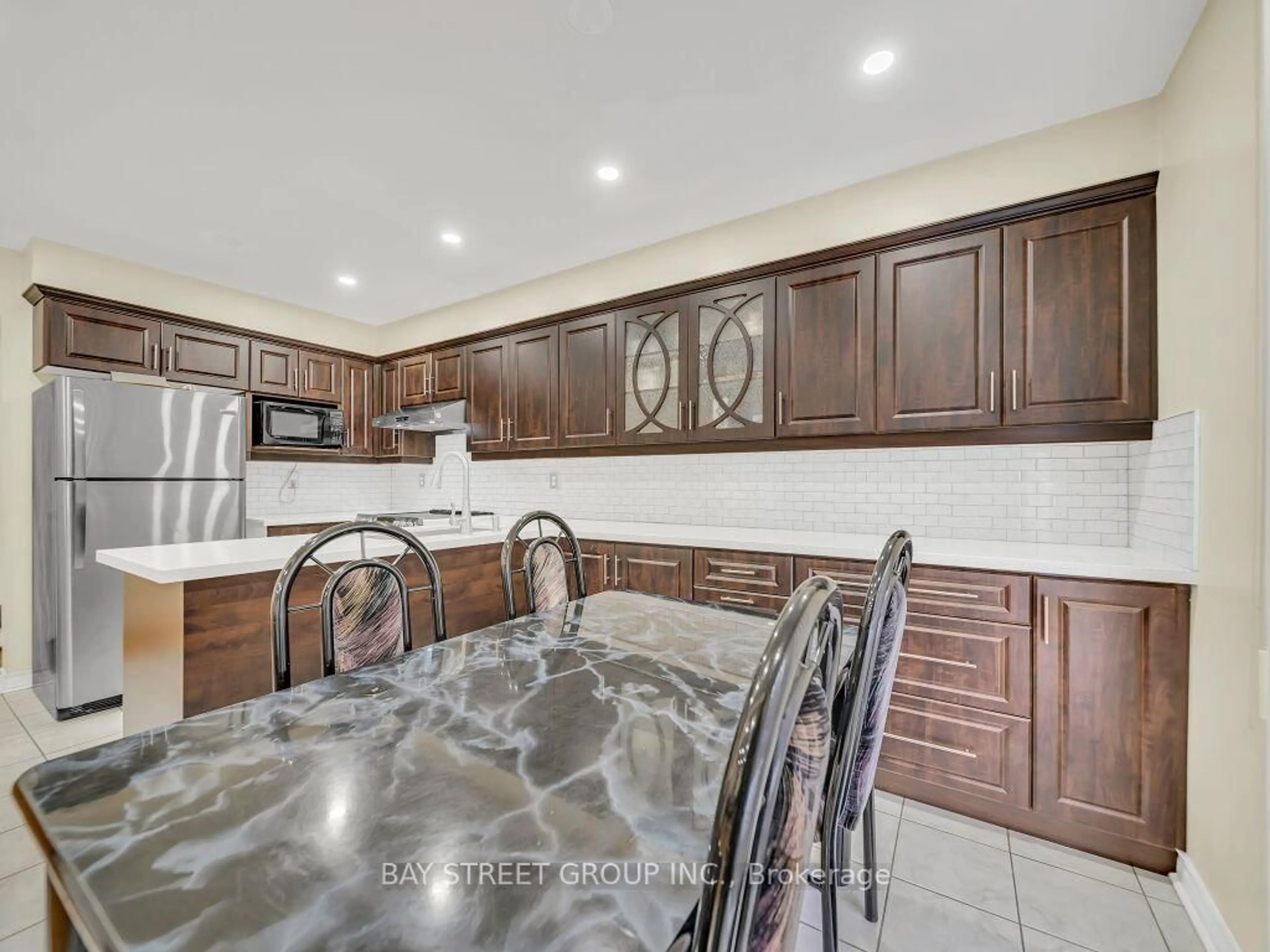 Open concept kitchen, ceramic/tile floor for 97 Quail Feather Cres, Brampton Ontario L6R 1S1