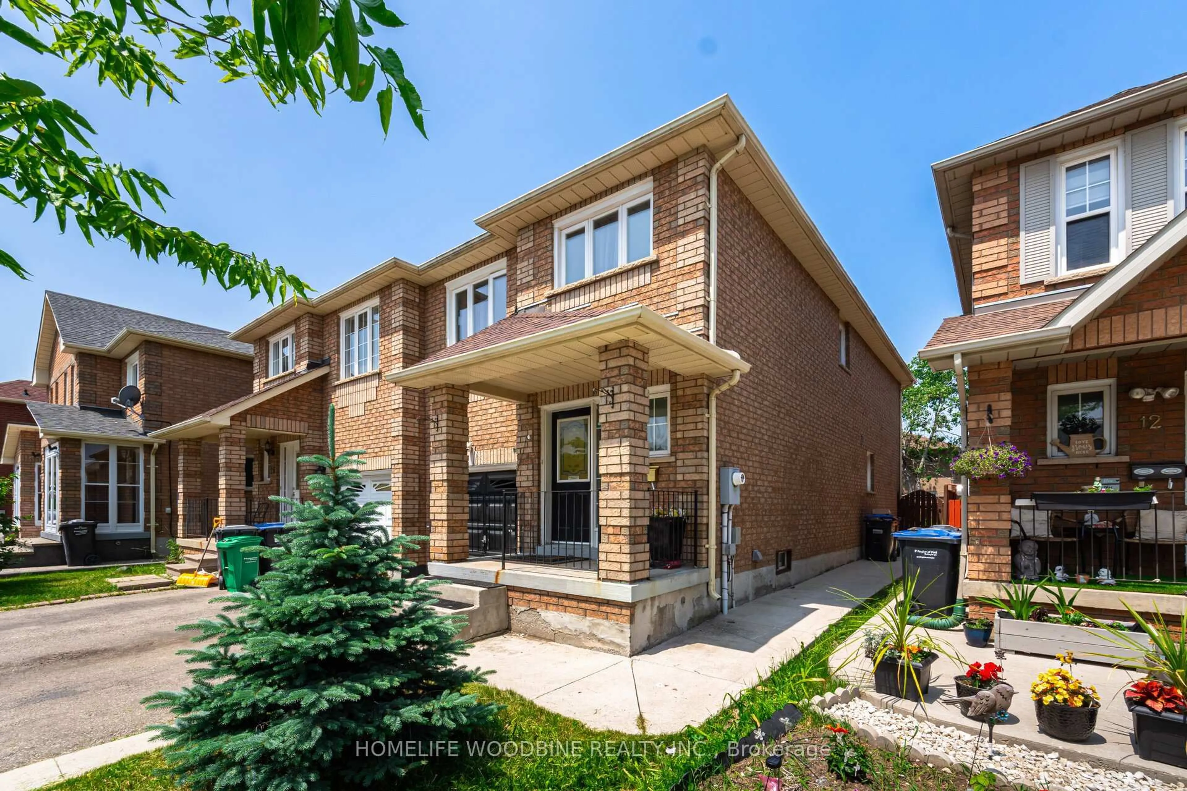 Home with brick exterior material, street for 14 Tessler Cres, Brampton Ontario L6X 4P8
