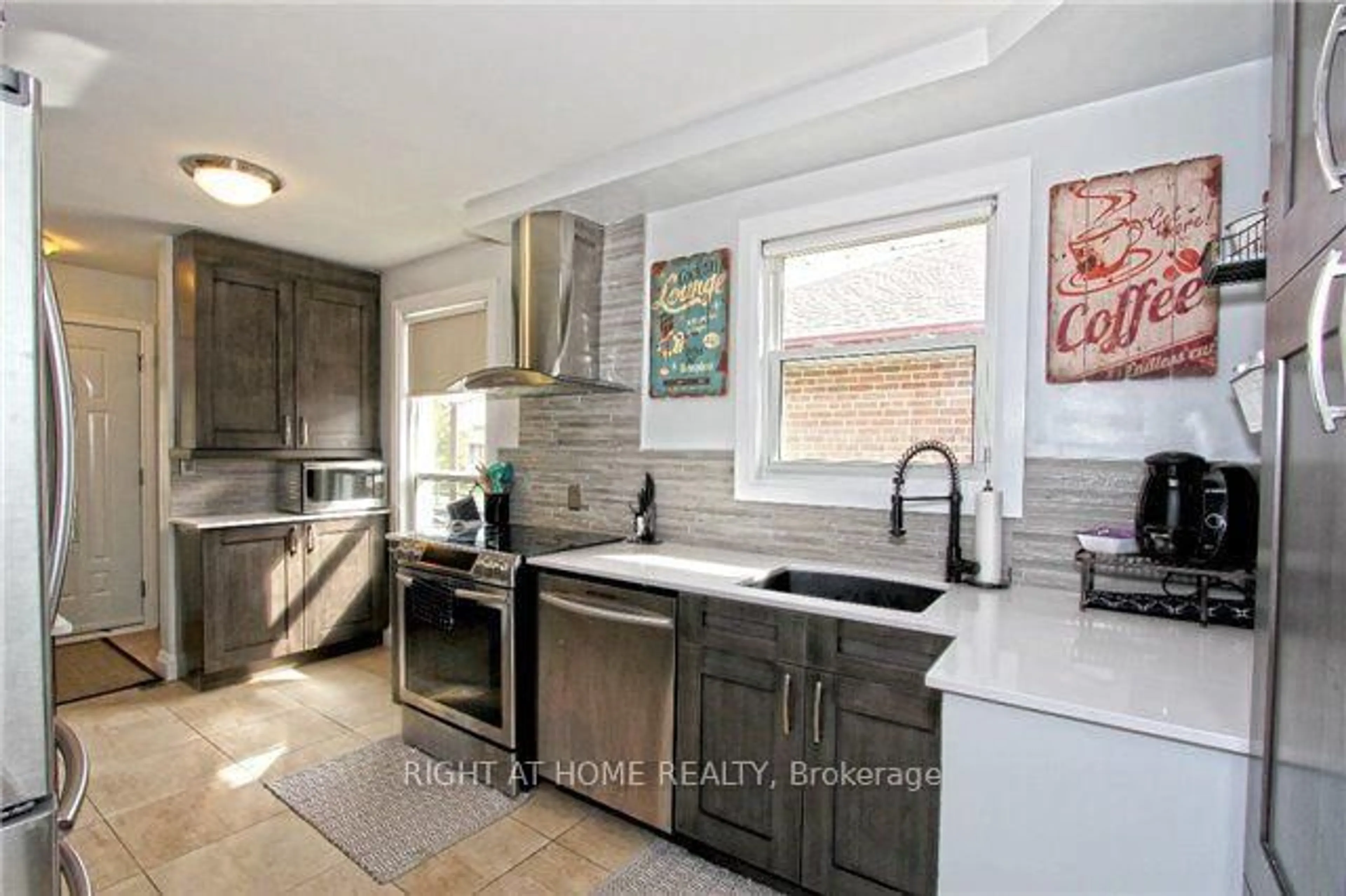 Open concept kitchen, ceramic/tile floor for 107 Alhart Dr, Toronto Ontario M9V 2N6