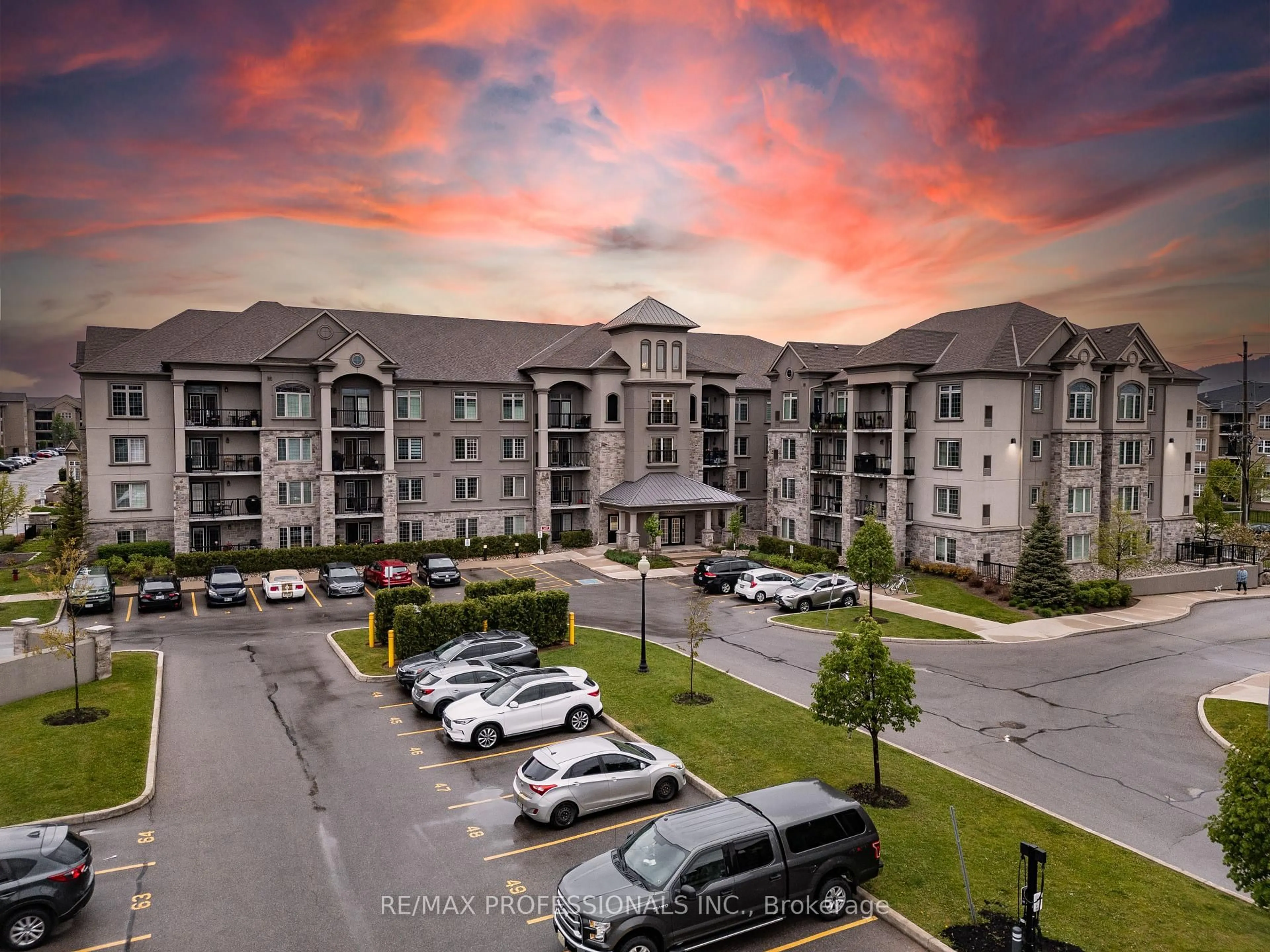 A pic from outside/outdoor area/front of a property/back of a property/a pic from drone, mountain view for 1440 Main St #108, Milton Ontario L9T 8W3