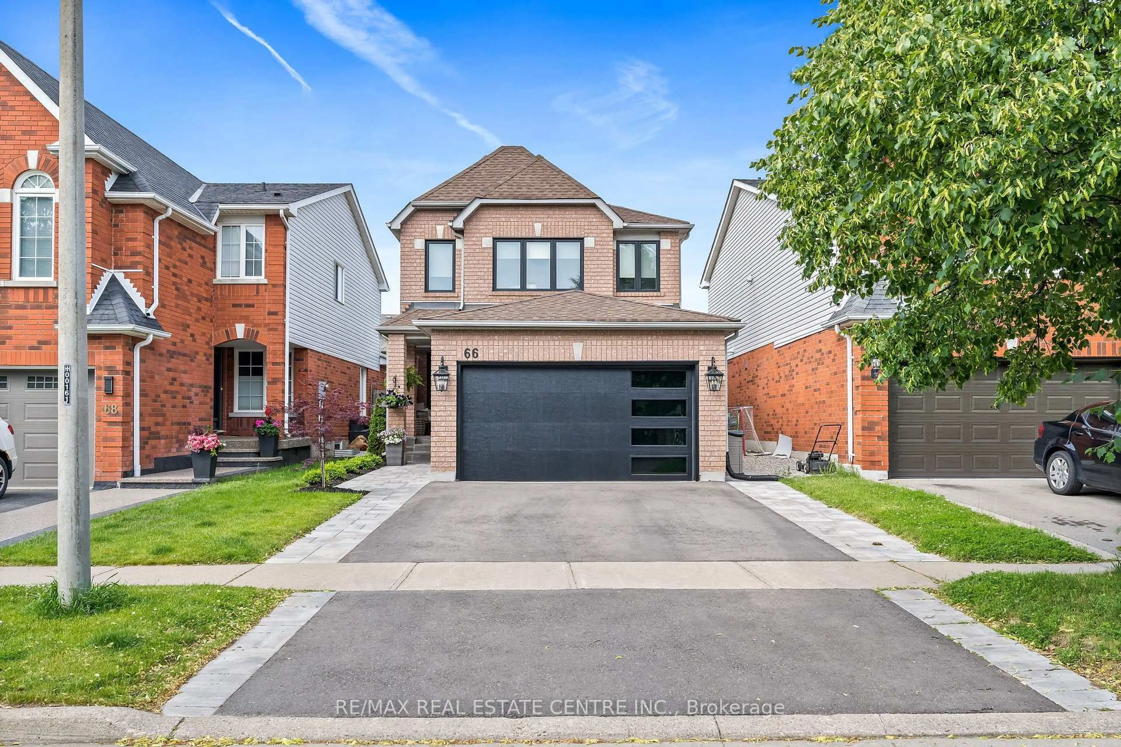 Home with brick exterior material, street for 66 Curry Cres, Halton Hills Ontario L7G 5T1
