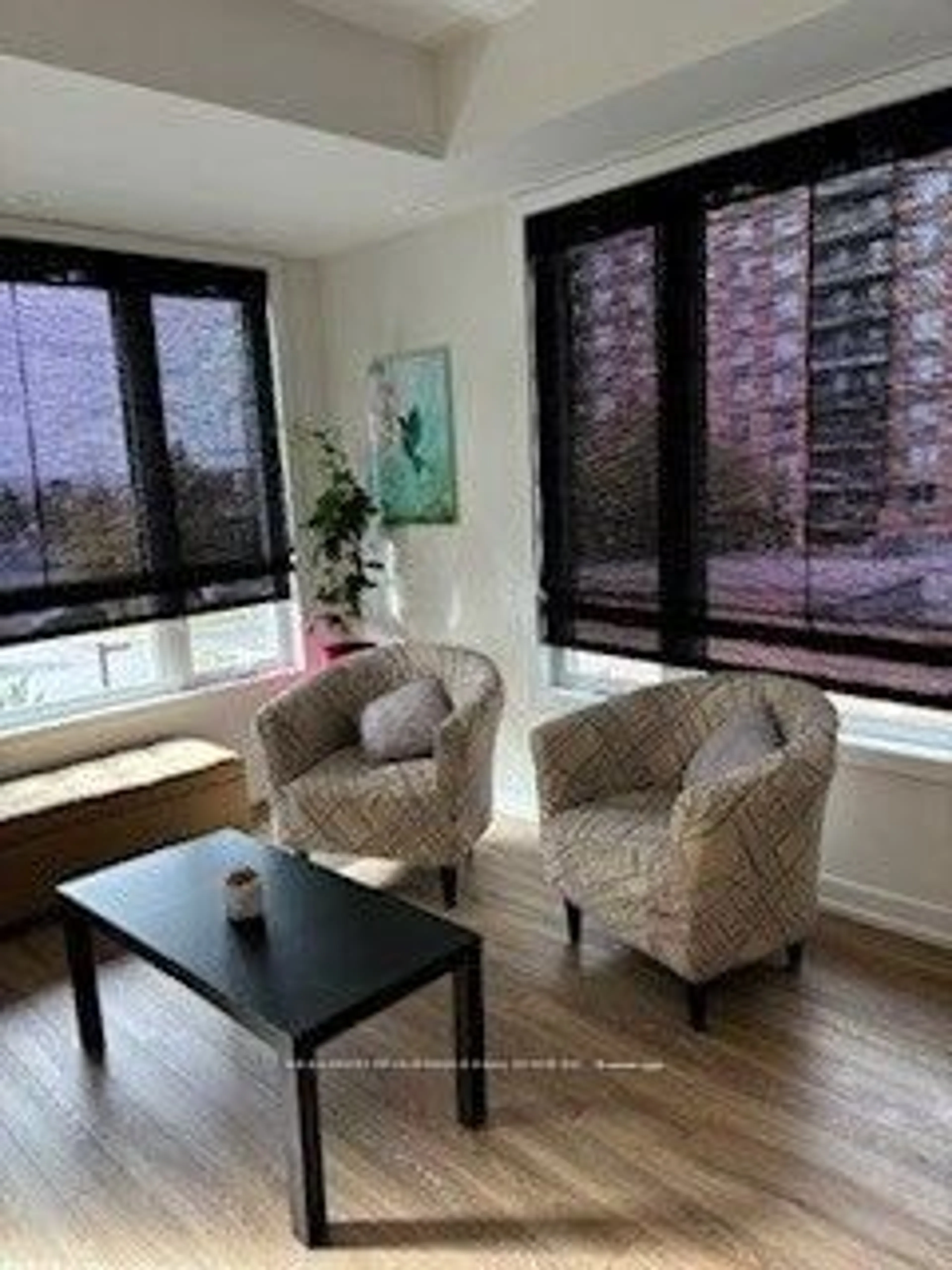 Living room with furniture, wood/laminate floor for 3421 Ridgeway Dr #11, Mississauga Ontario L5L 5T3