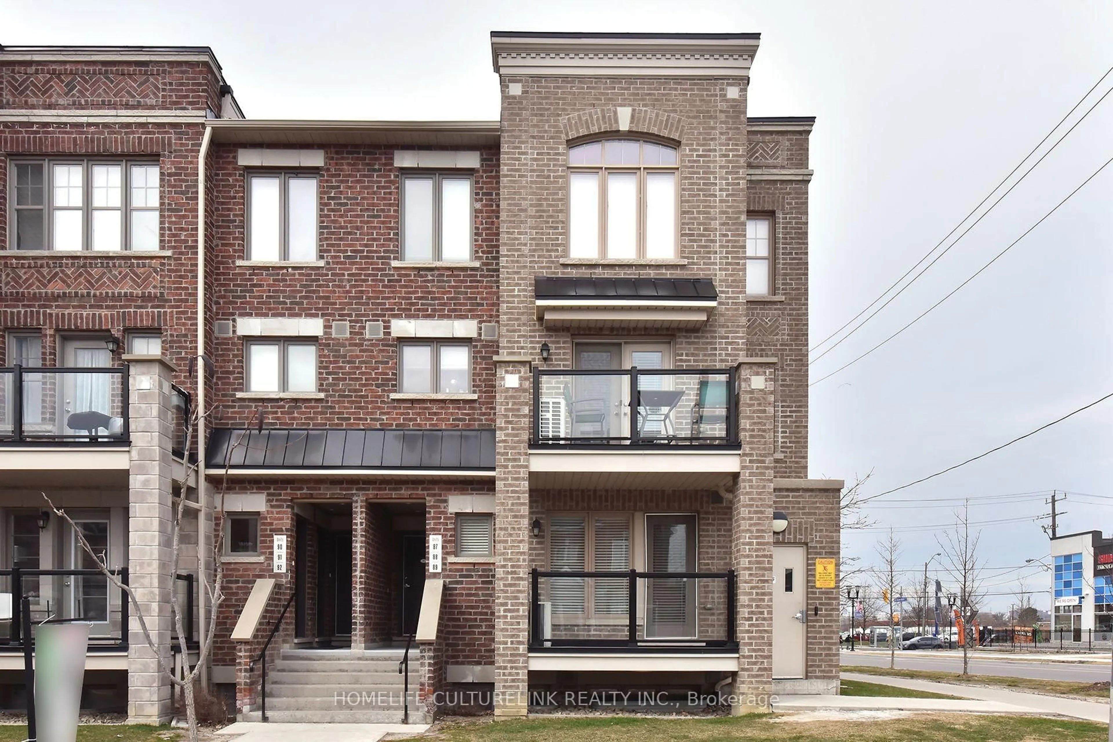 Home with brick exterior material, street for 100 Parrotta Dr #89, Toronto Ontario M9M 0B5