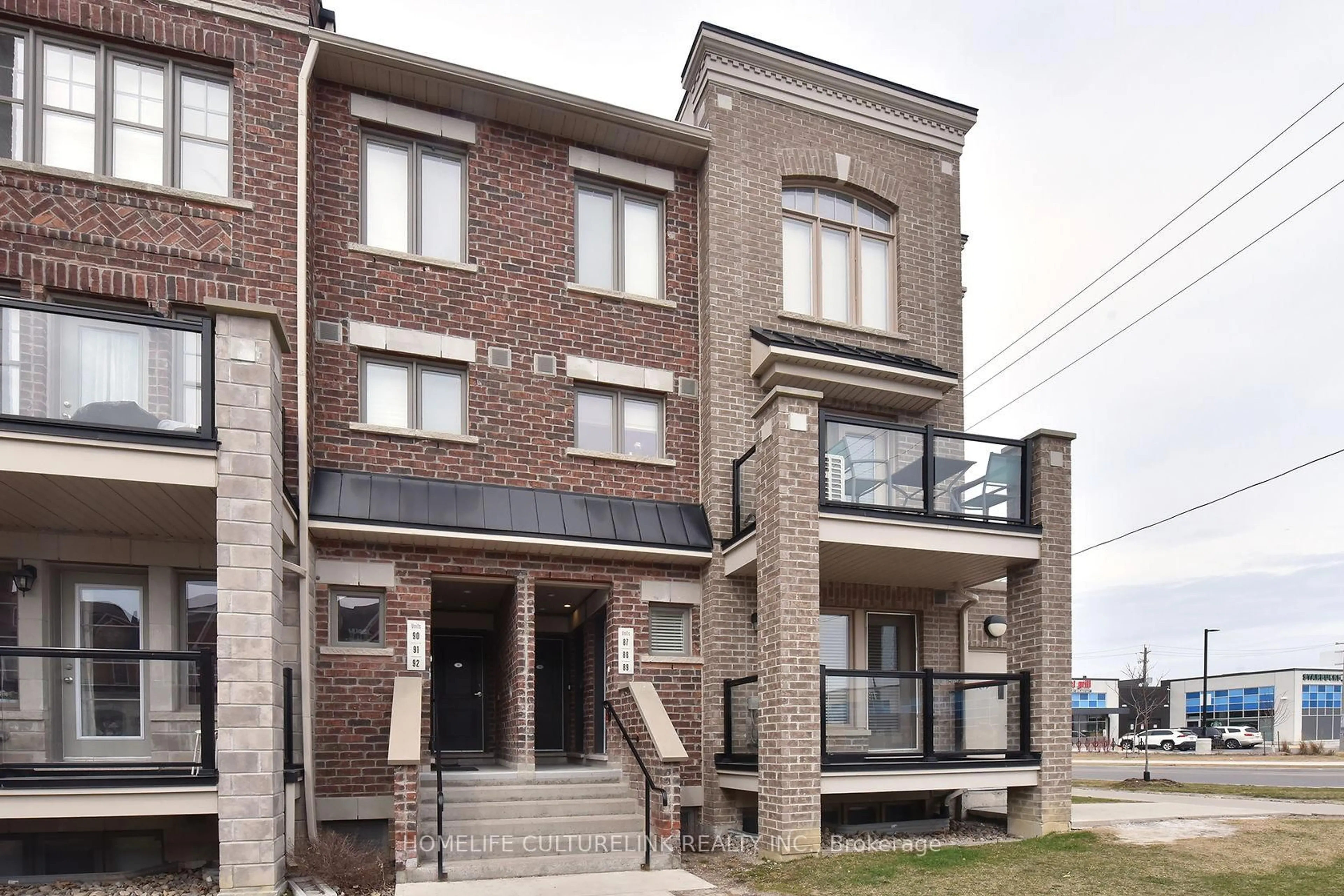Home with brick exterior material, street for 100 Parrotta Dr #89, Toronto Ontario M9M 0B5