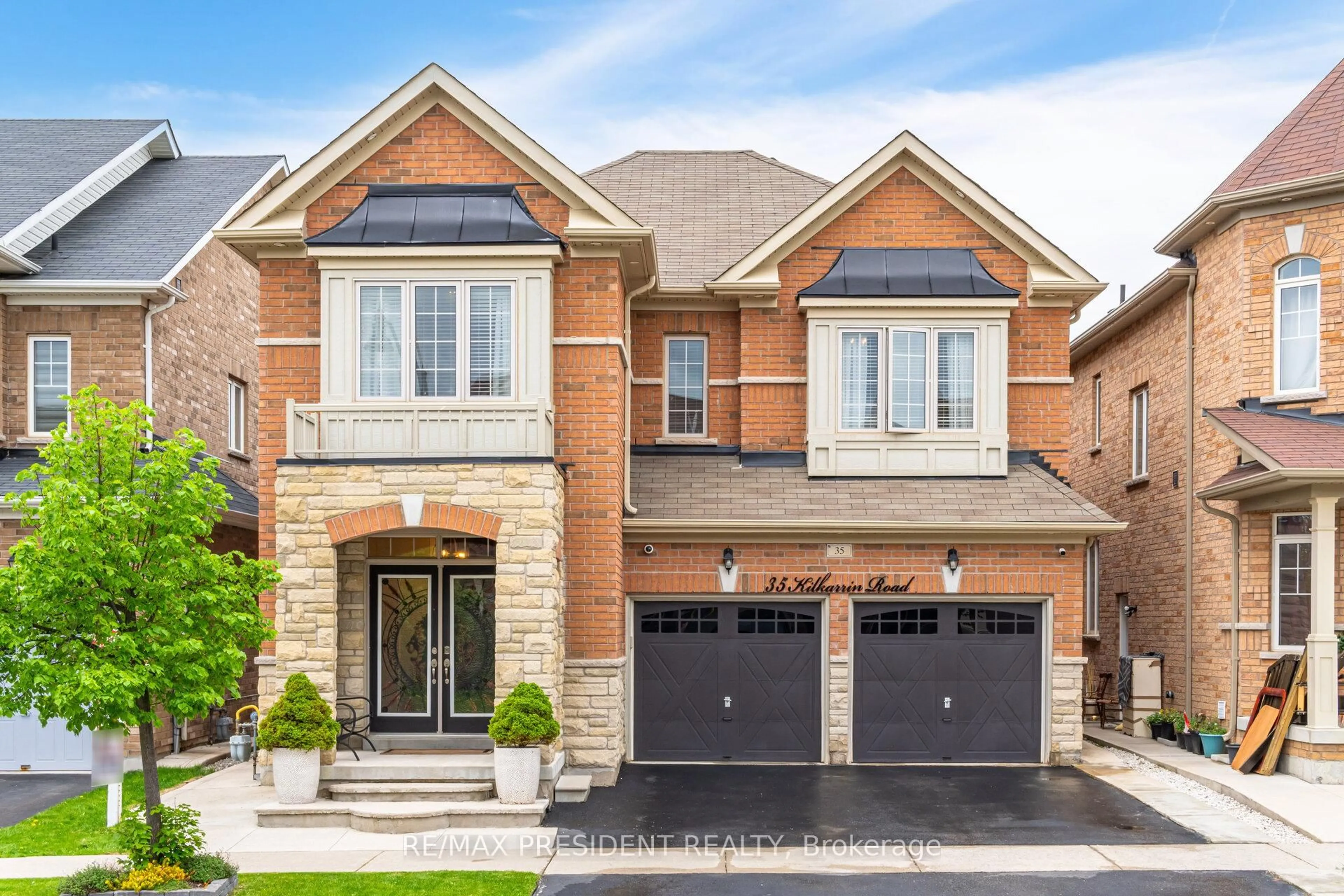 Home with brick exterior material, street for 35 Kilkarrin Rd, Brampton Ontario L7A 4C6