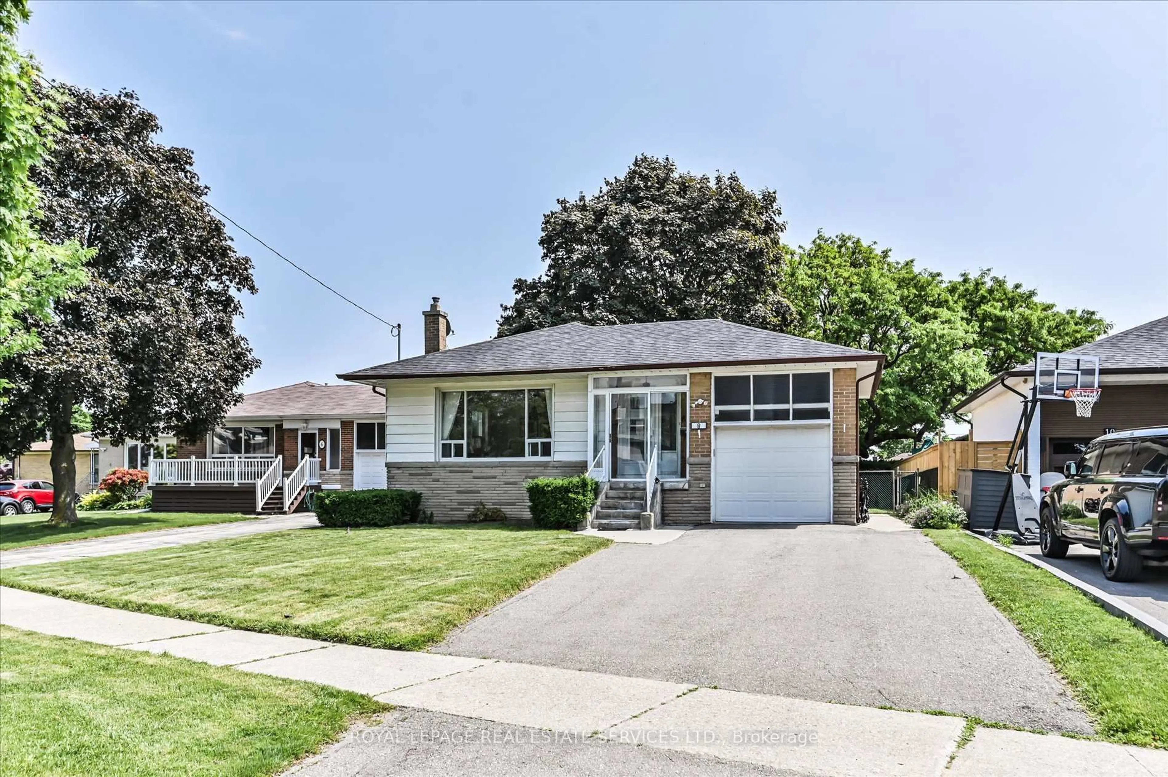 Home with vinyl exterior material, street for 8 Baskerville Cres, Toronto Ontario M9C 1T7