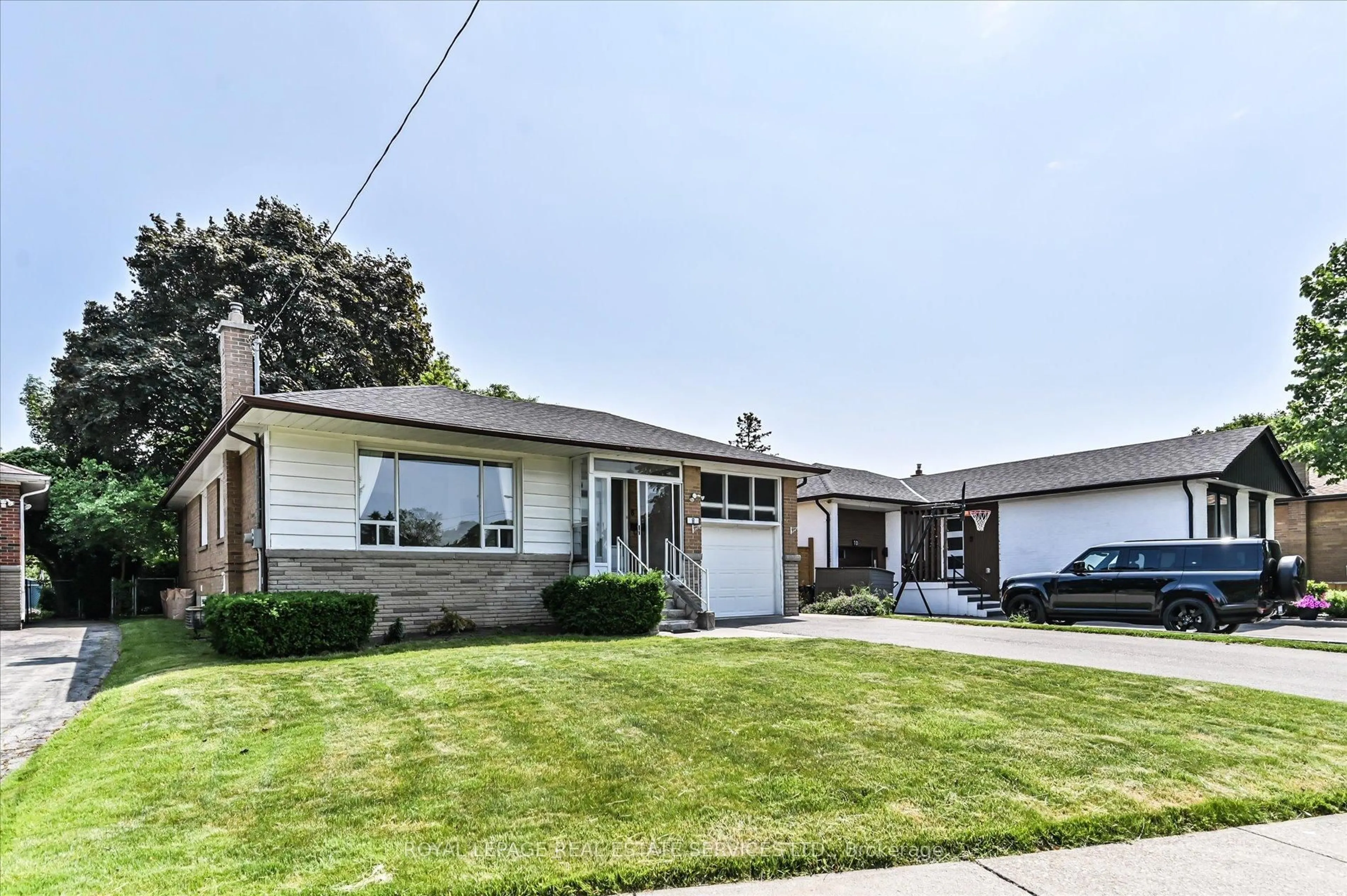 Home with vinyl exterior material, street for 8 Baskerville Cres, Toronto Ontario M9C 1T7