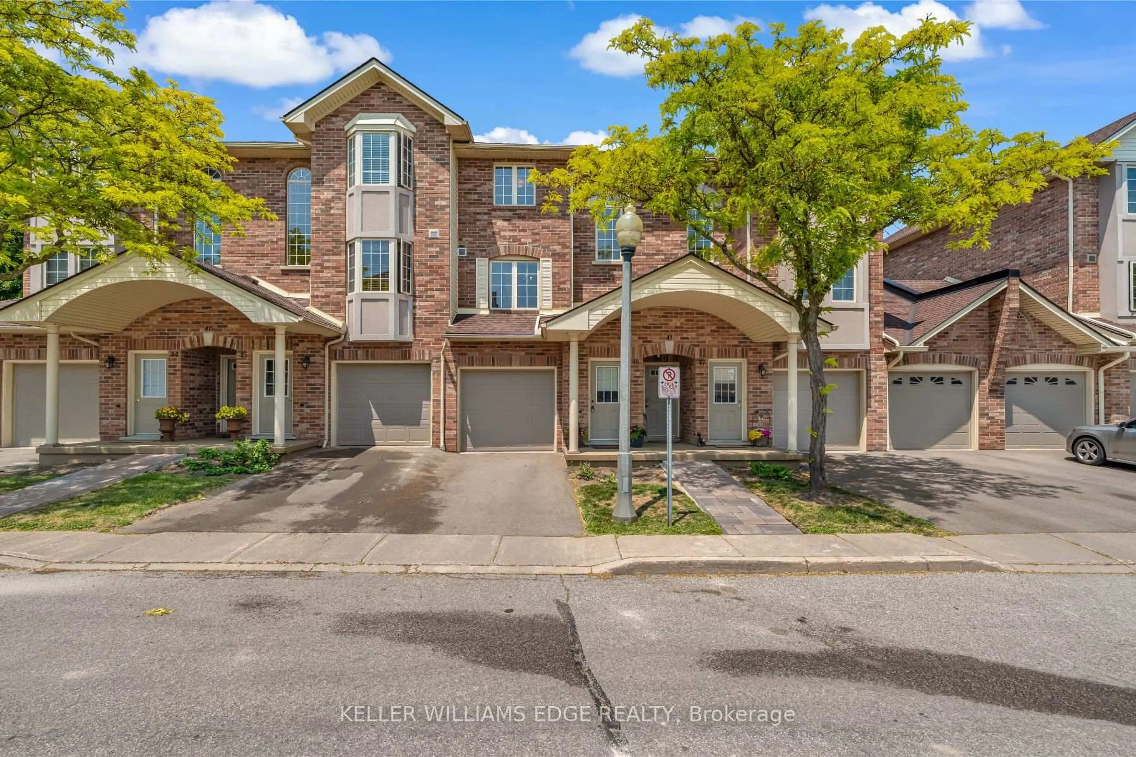 A pic from outside/outdoor area/front of a property/back of a property/a pic from drone, street for 4045 Upper Middle Rd #46, Burlington Ontario L7M 4S9