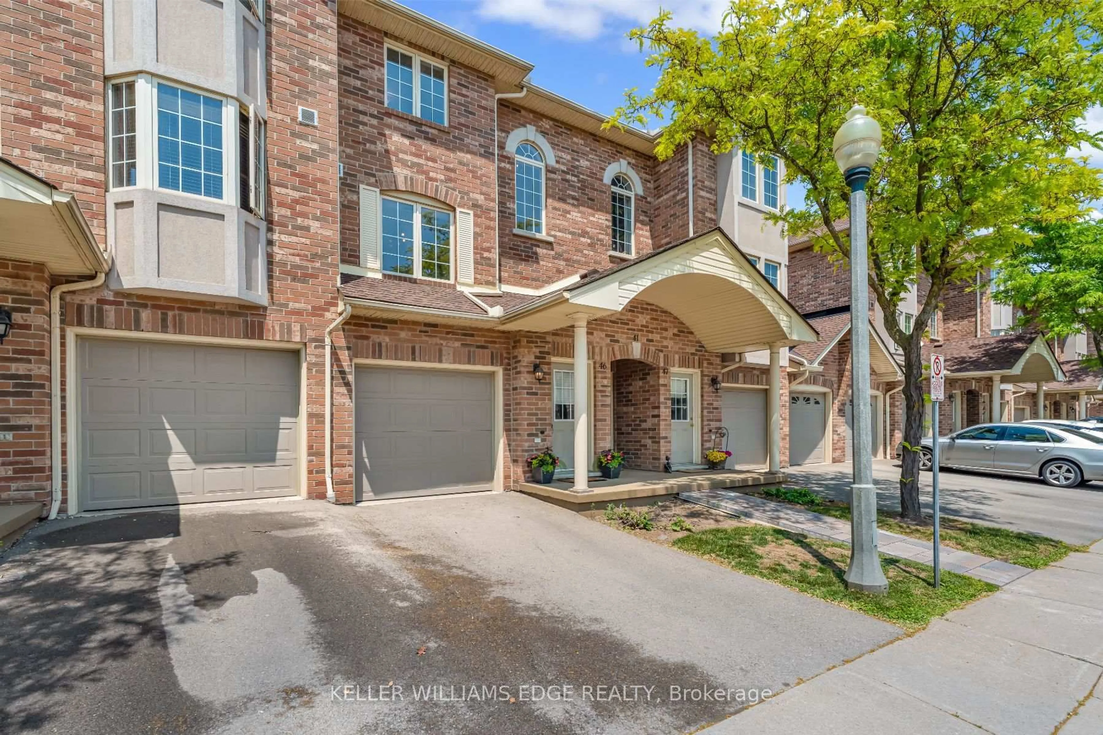 Home with brick exterior material, street for 4045 Upper Middle Rd #46, Burlington Ontario L7M 4S9