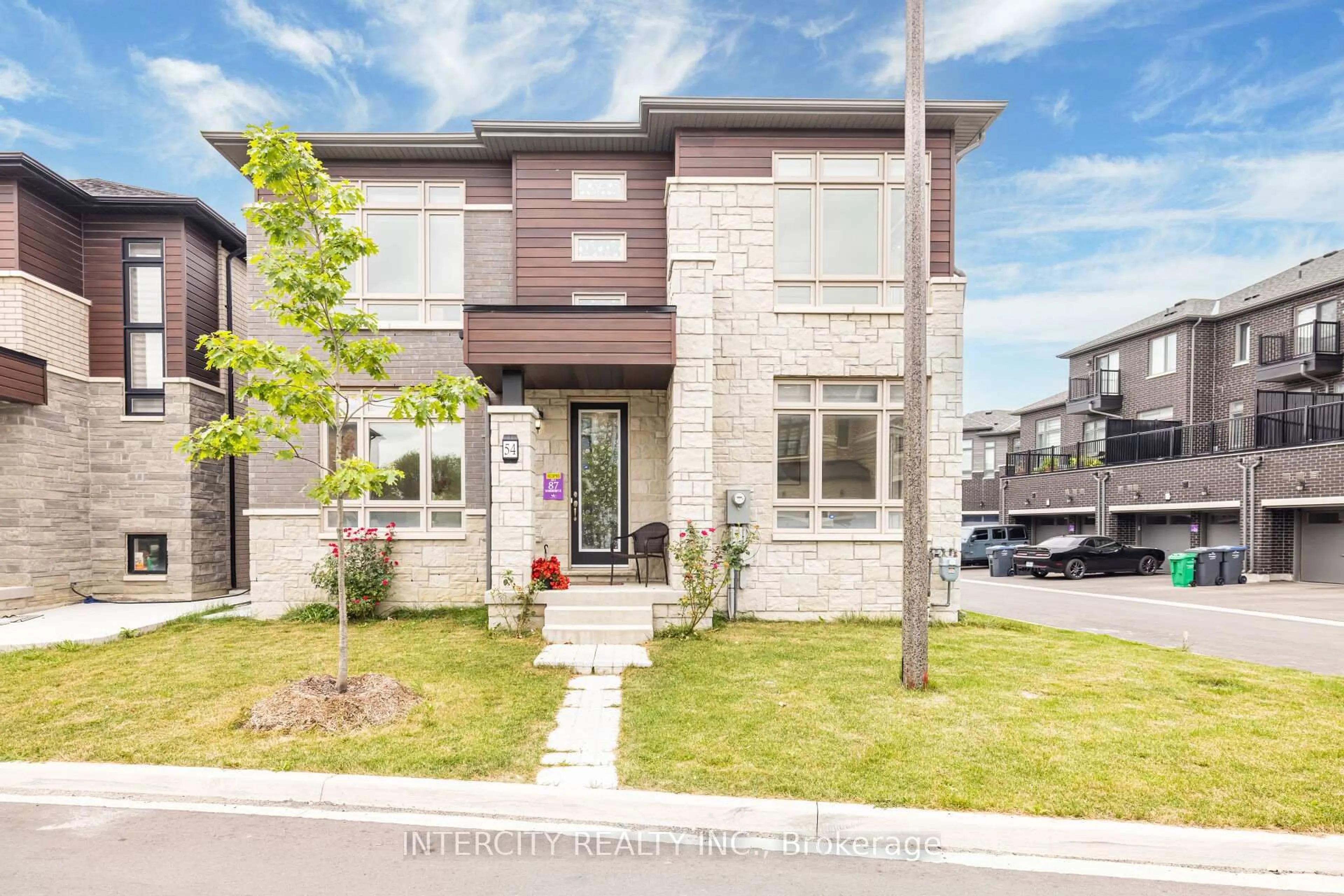 Home with brick exterior material, street for 54 Moorcroft Pl, Brampton Ontario L6P 4P7
