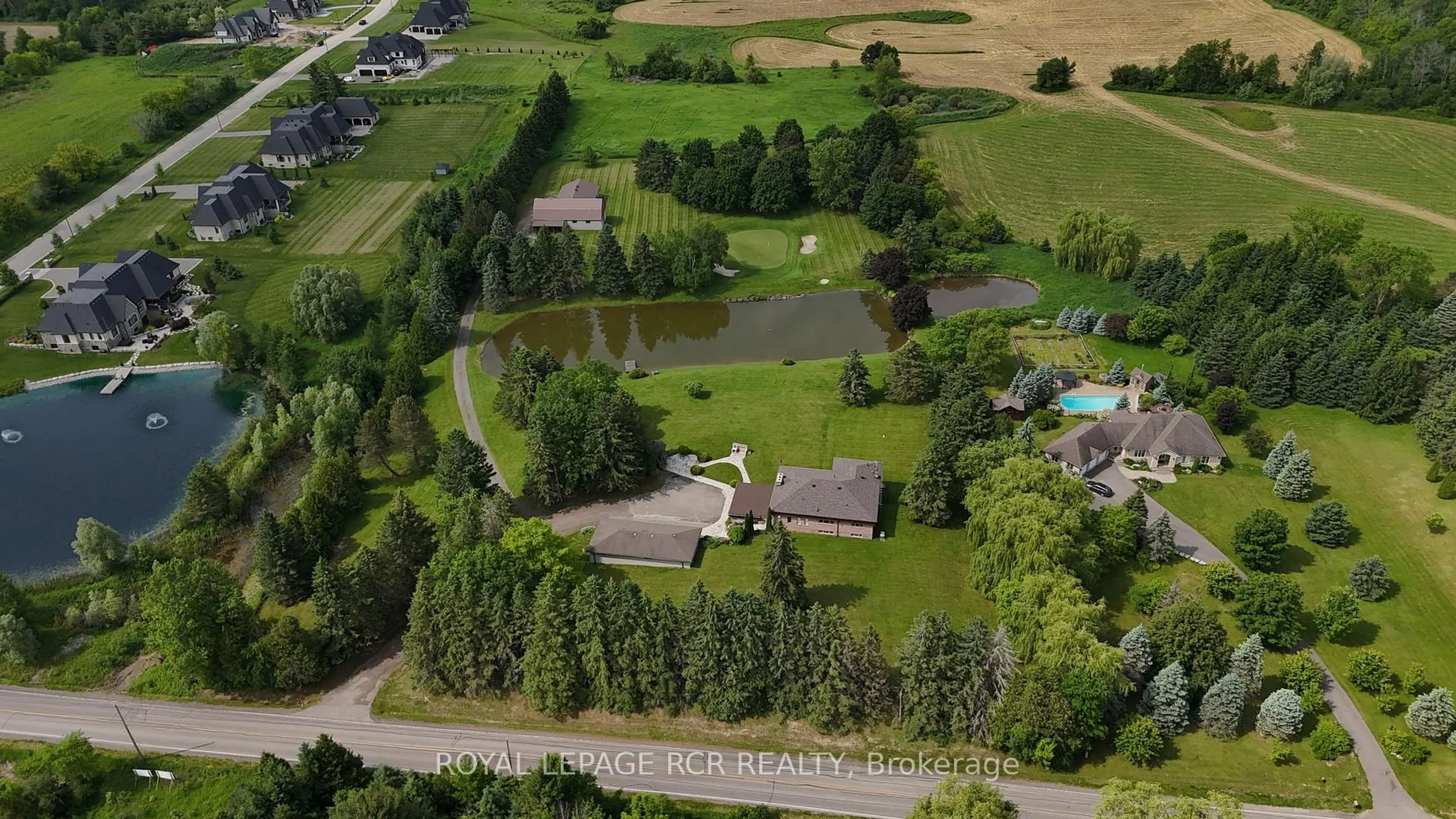 A pic from outside/outdoor area/front of a property/back of a property/a pic from drone, water/lake/river/ocean view for 15486 Mount Pleasant Rd, Caledon Ontario L7E 3M4