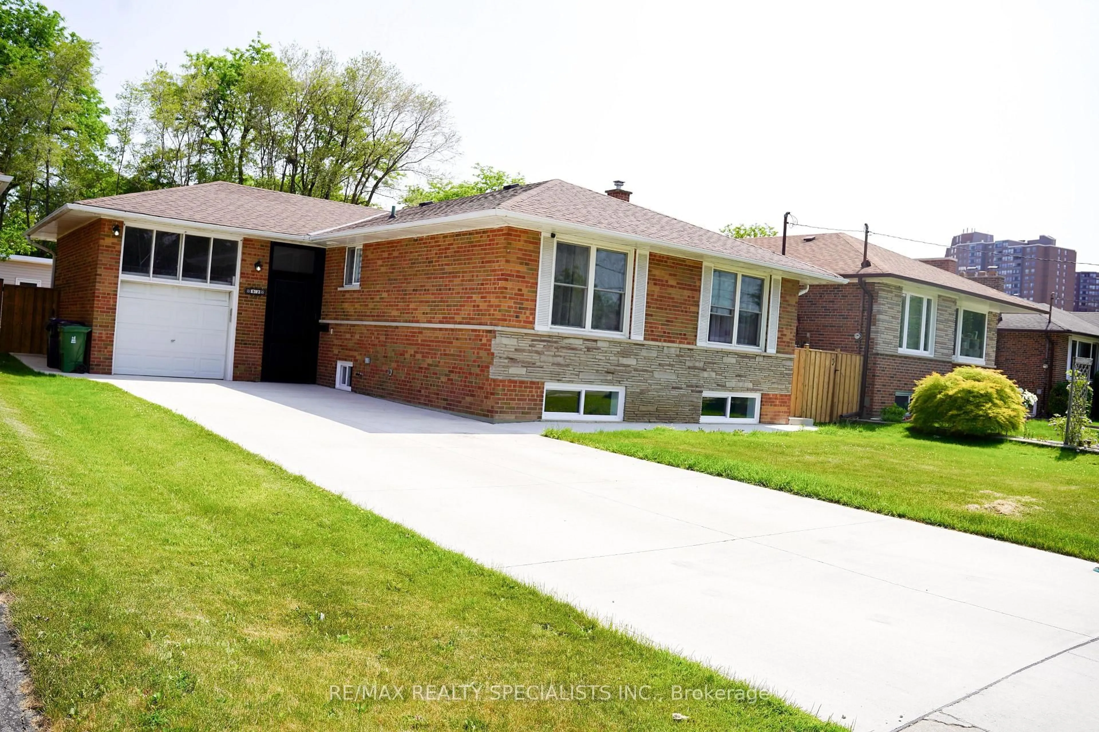 Home with brick exterior material, street for 52 Robinglade Dr, Toronto Ontario M9B 2R1