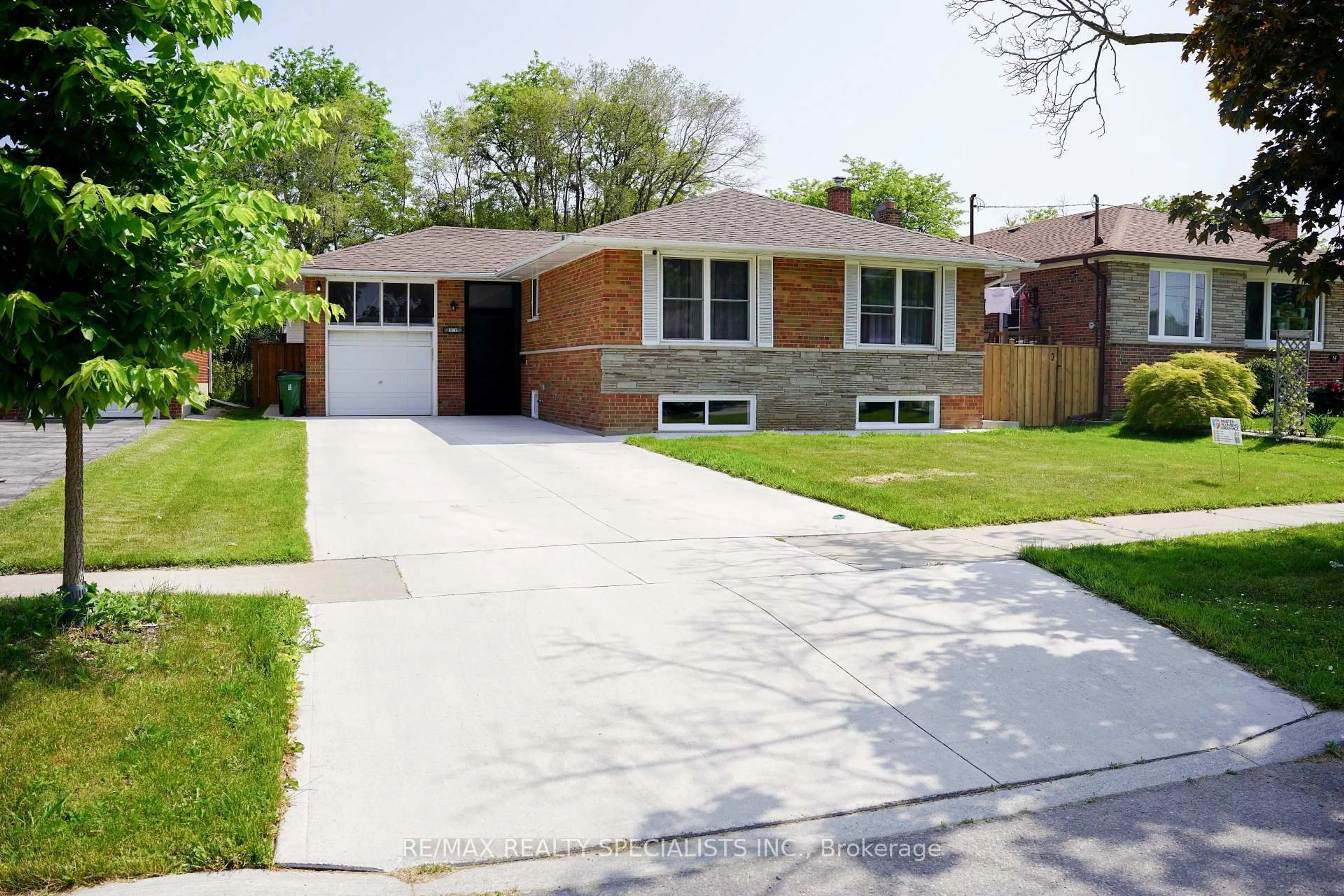 Home with brick exterior material, street for 52 Robinglade Dr, Toronto Ontario M9B 2R1