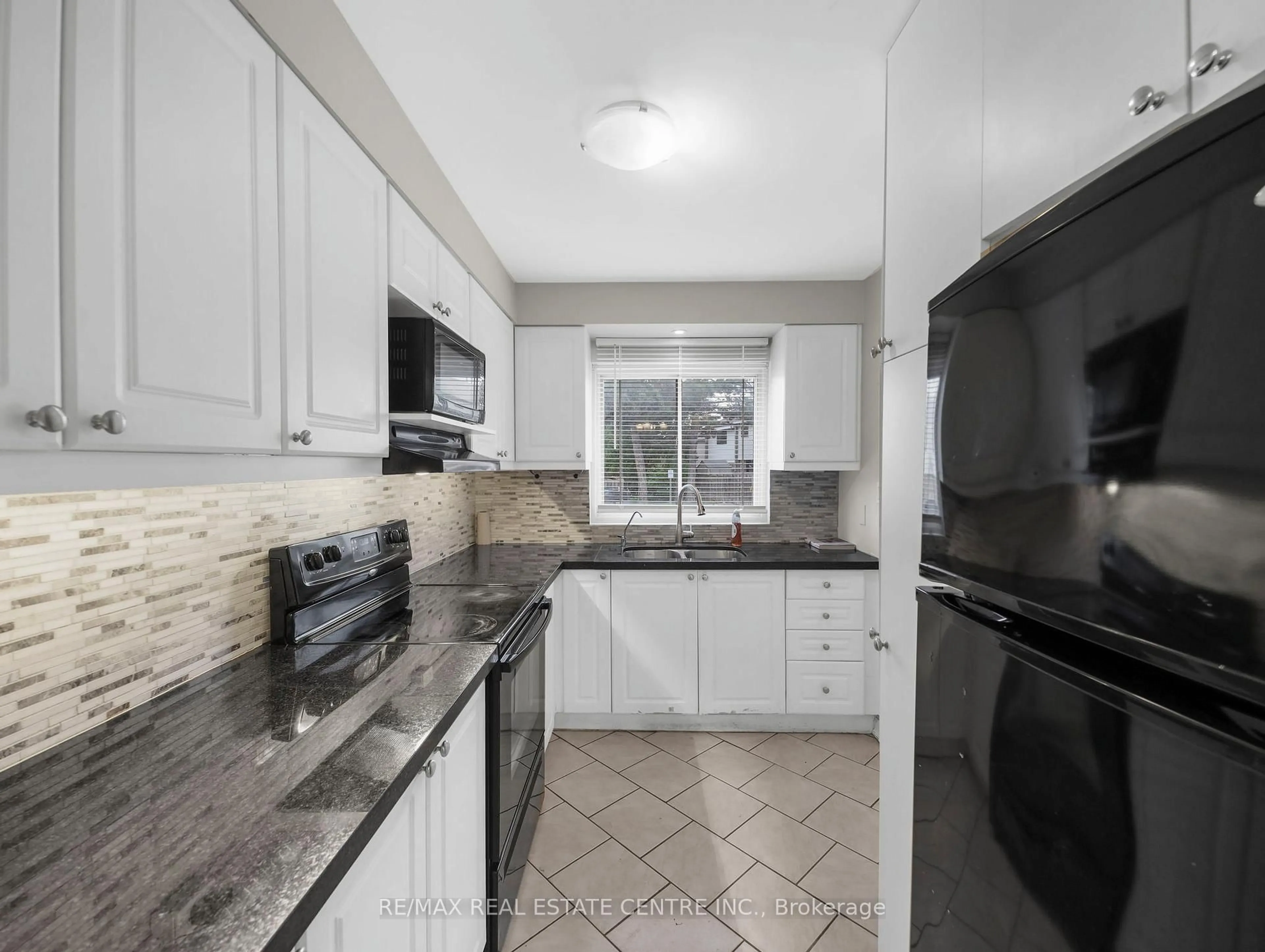 Standard kitchen, ceramic/tile floor for 2779 Gananoque Dr #88, Mississauga Ontario L5N 2E4