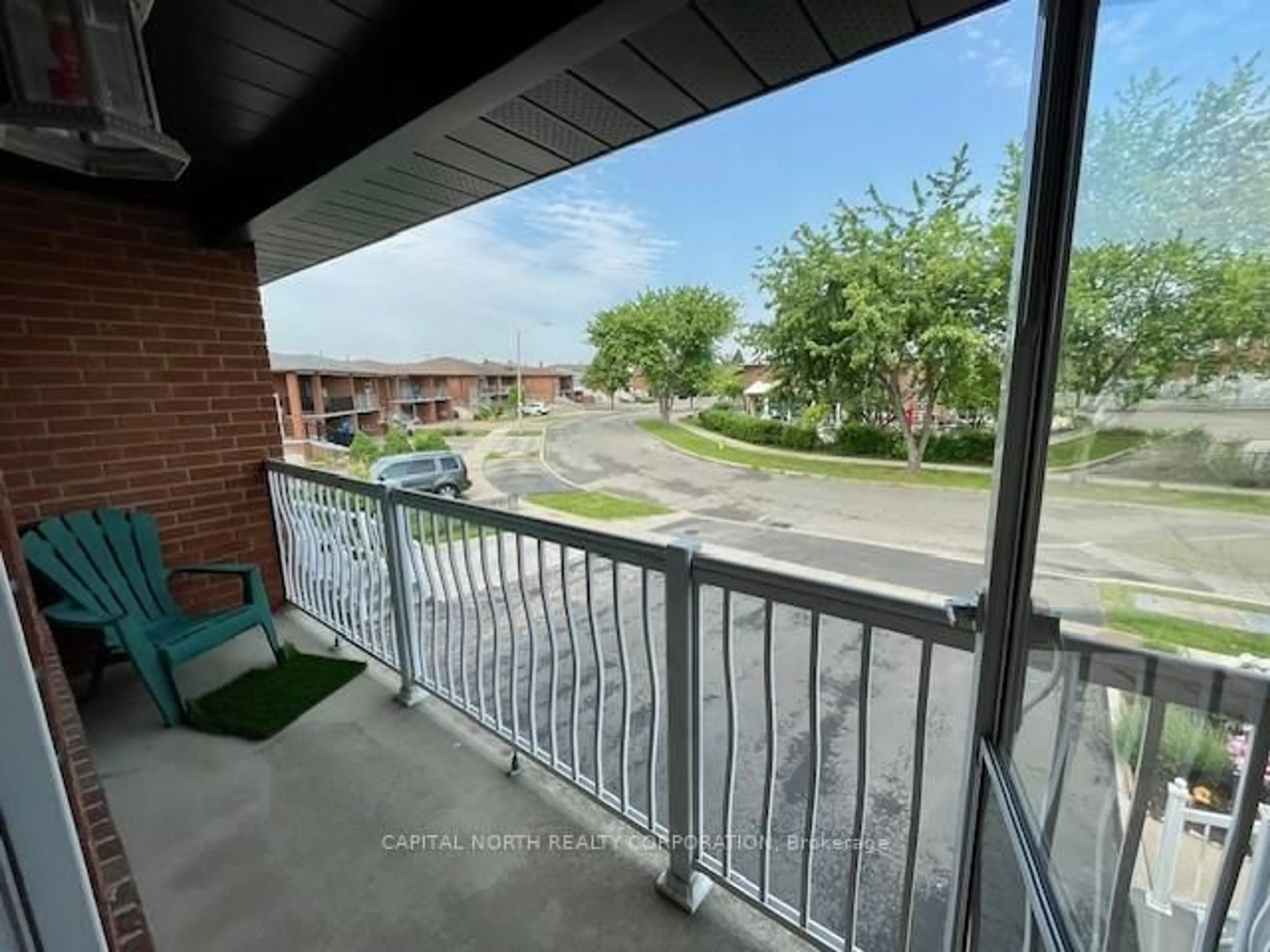 Patio, city buildings view from balcony for 9 Sawmill Rd, Toronto Ontario M3L 2L3