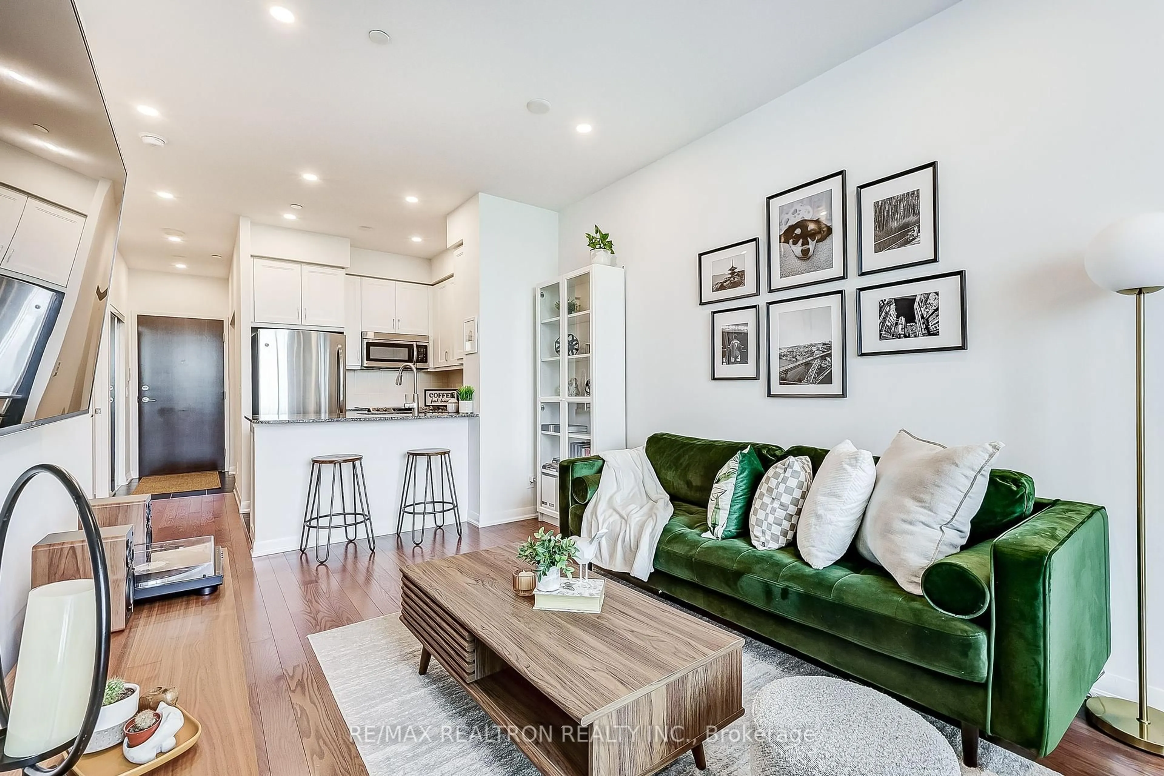 Living room with furniture, wood/laminate floor for 215 Sherway Gardens Rd #315, Toronto Ontario M9C 0A4