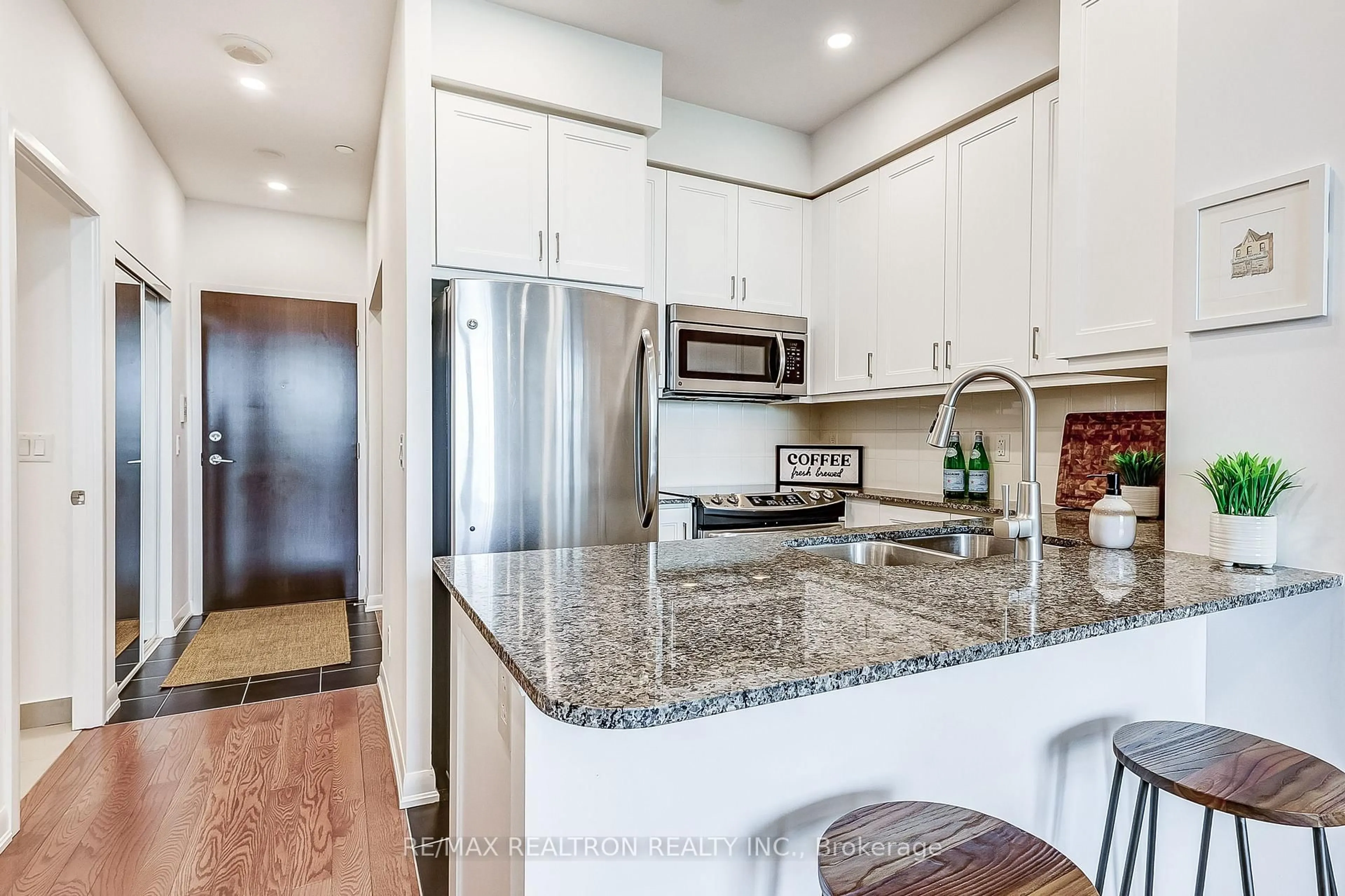 Open concept kitchen, ceramic/tile floor for 215 Sherway Gardens Rd #315, Toronto Ontario M9C 0A4