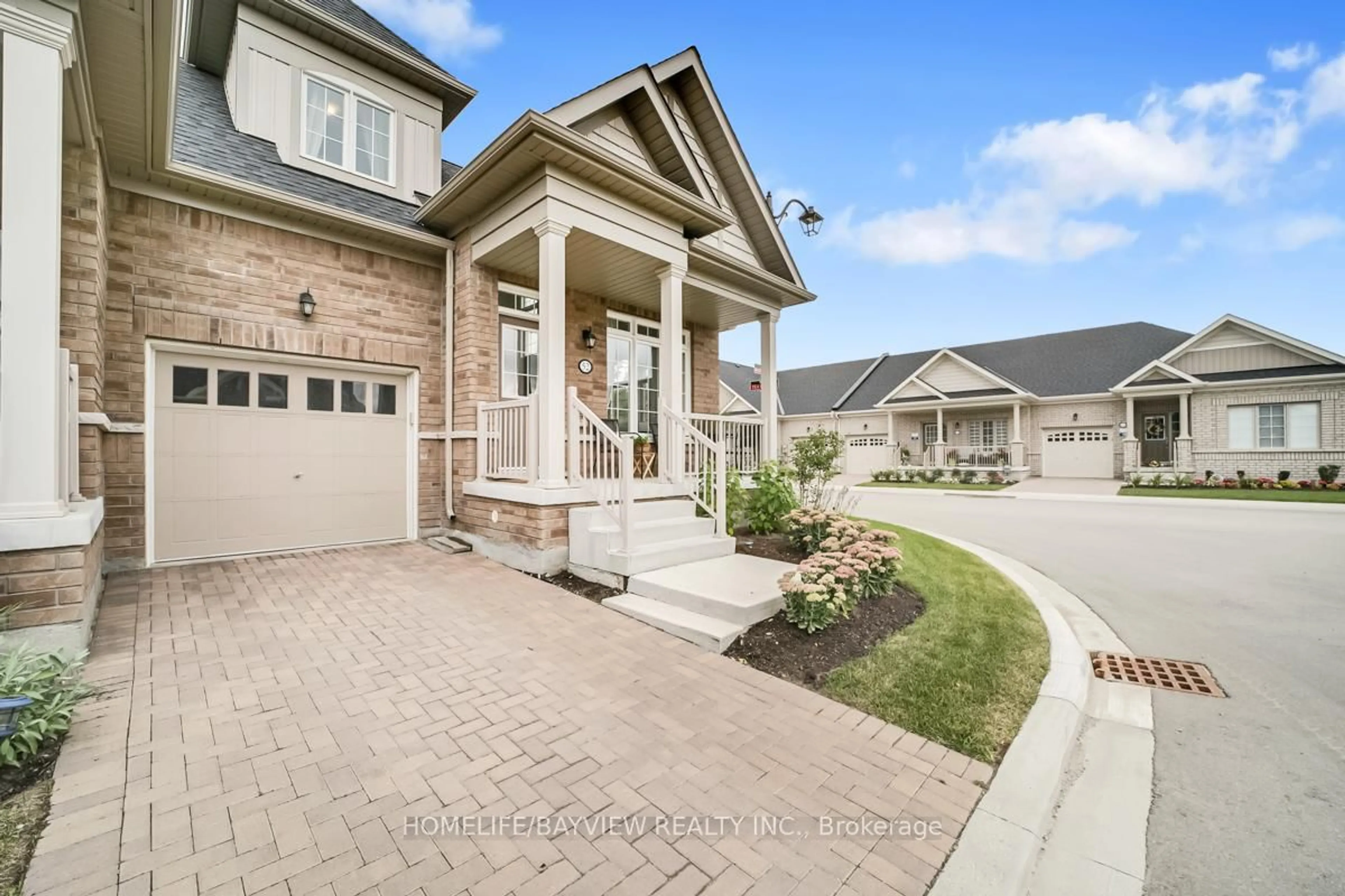 Home with brick exterior material, street for 52 Bluestone Cres, Brampton Ontario L6R 4B8