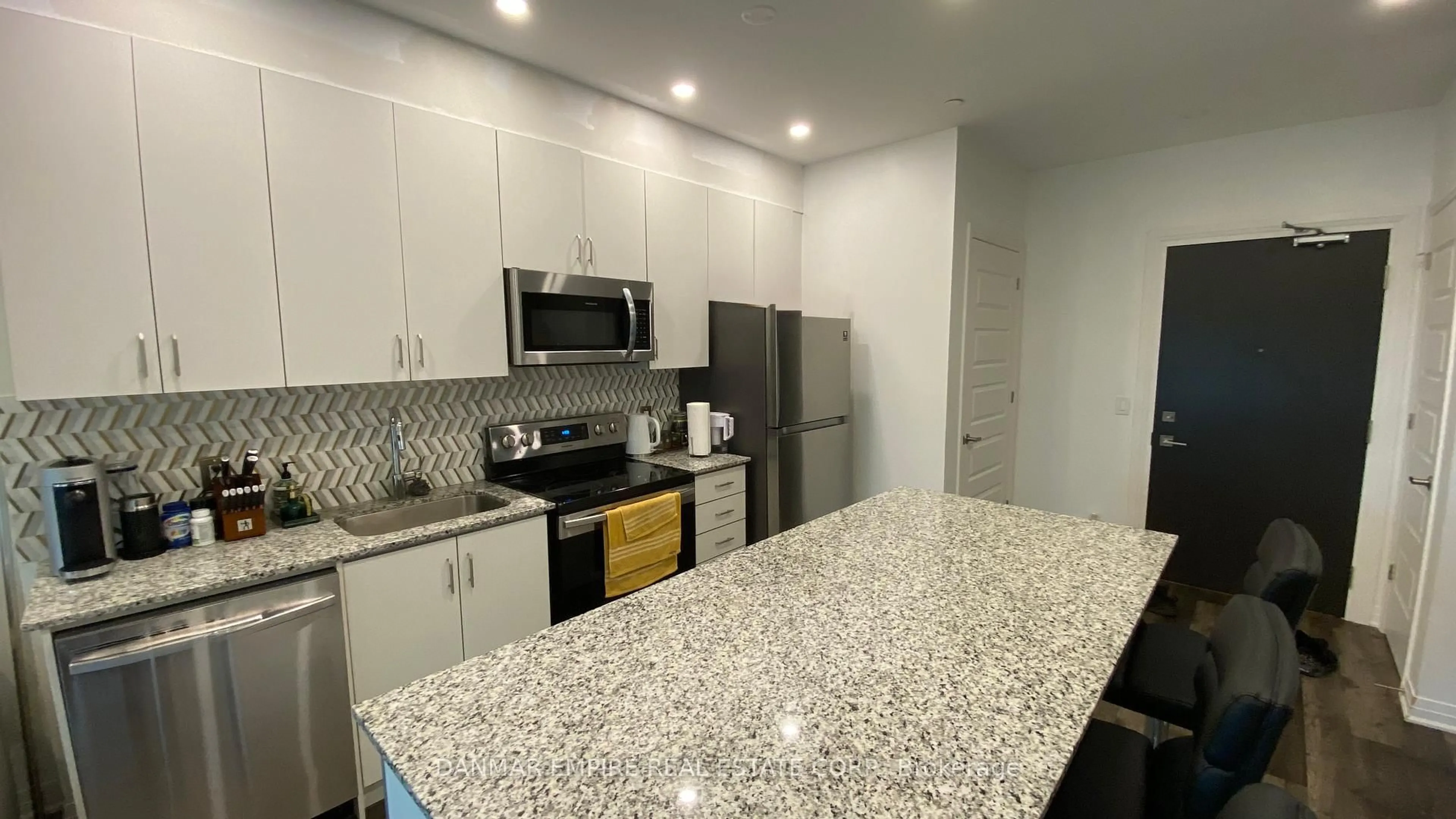 Standard kitchen, ceramic/tile floor for 102 Grovewood Common Rd #305, Oakville Ontario L6H 0X2