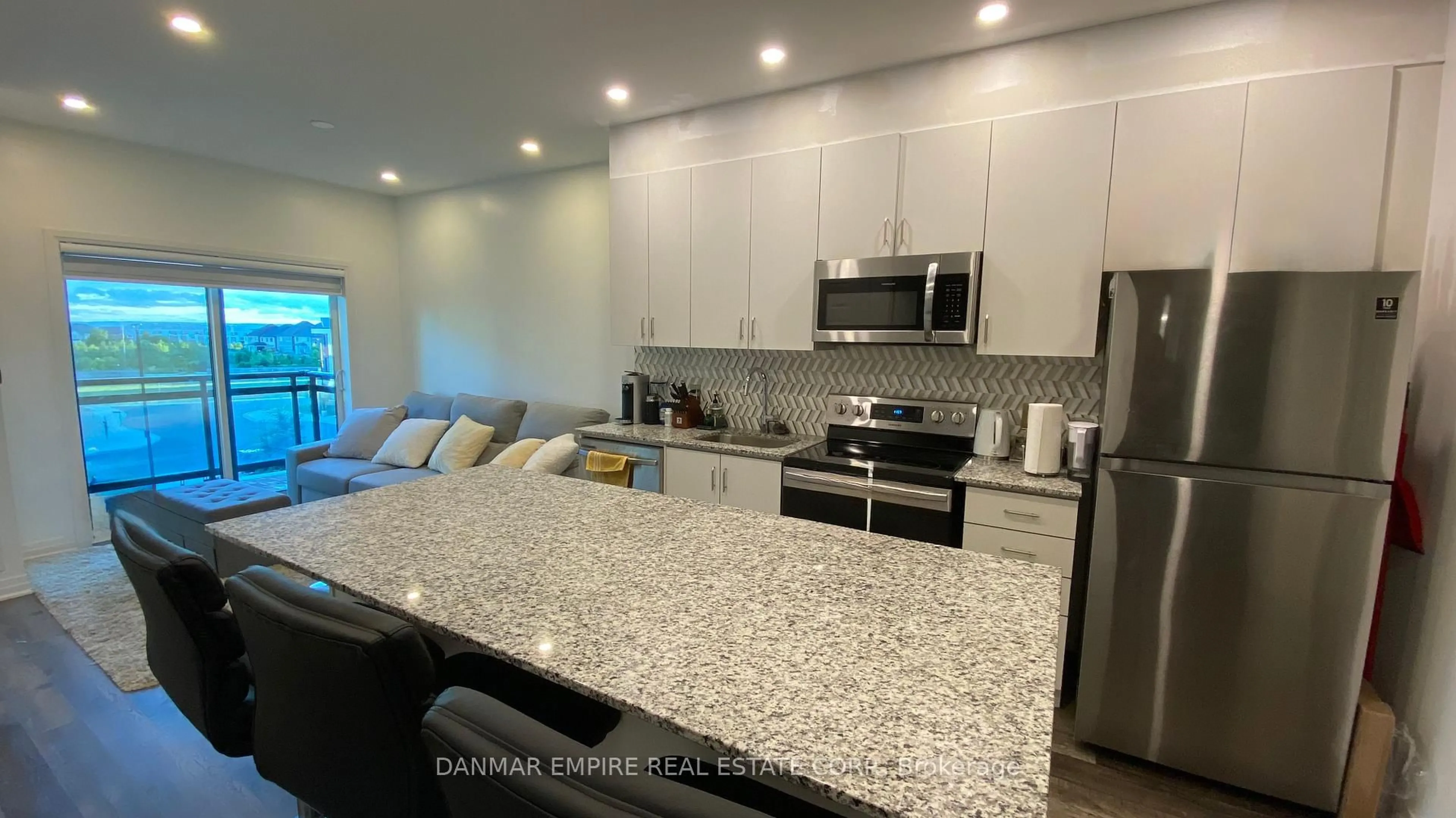 Open concept kitchen, ceramic/tile floor for 102 Grovewood Common Rd #305, Oakville Ontario L6H 0X2