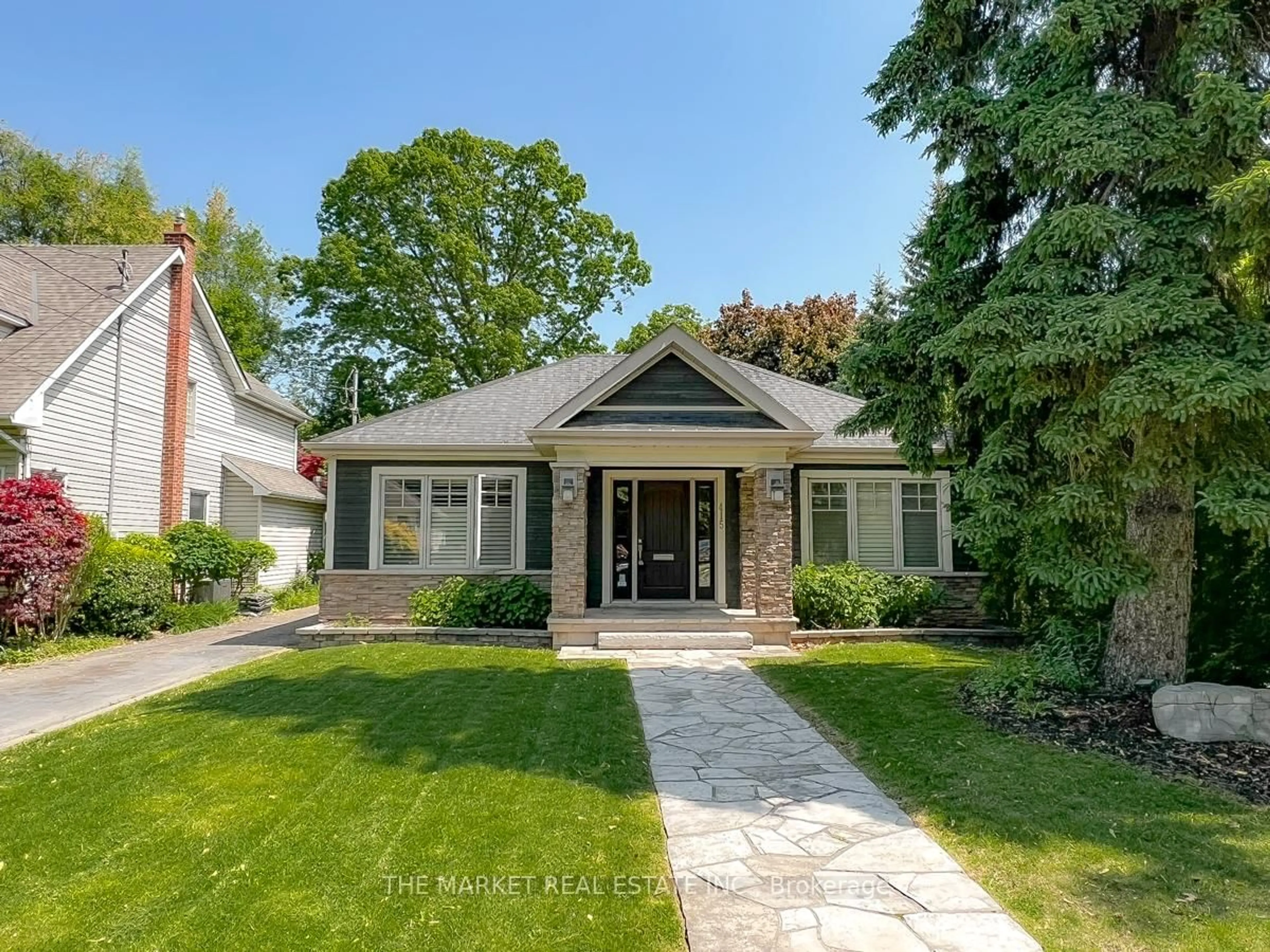 Home with brick exterior material, street for 415 Queen Mary Dr, Oakville Ontario L6K 3M2
