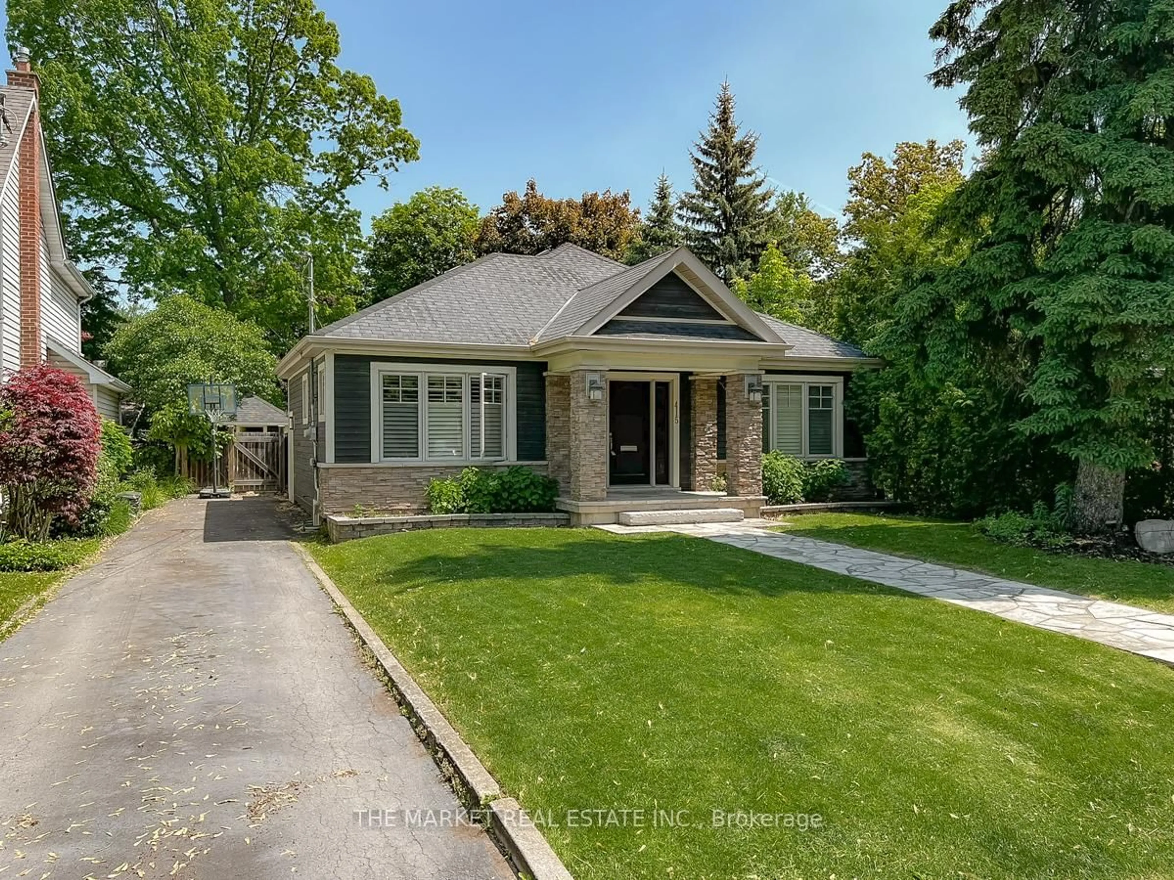 Home with brick exterior material, street for 415 Queen Mary Dr, Oakville Ontario L6K 3M2