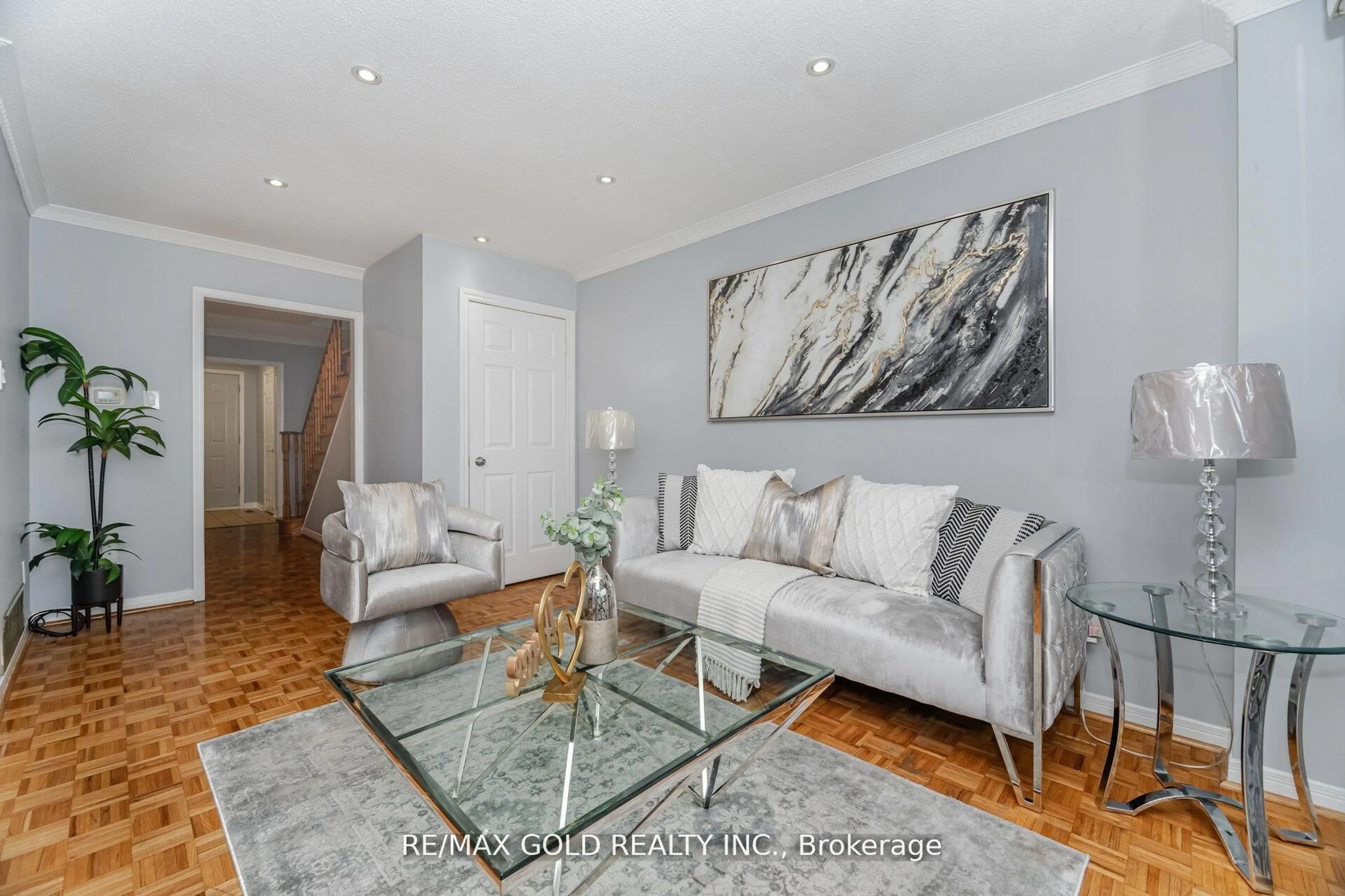 Living room with furniture, wood/laminate floor for 58 Kesteven Cres, Brampton Ontario L6W 4E5