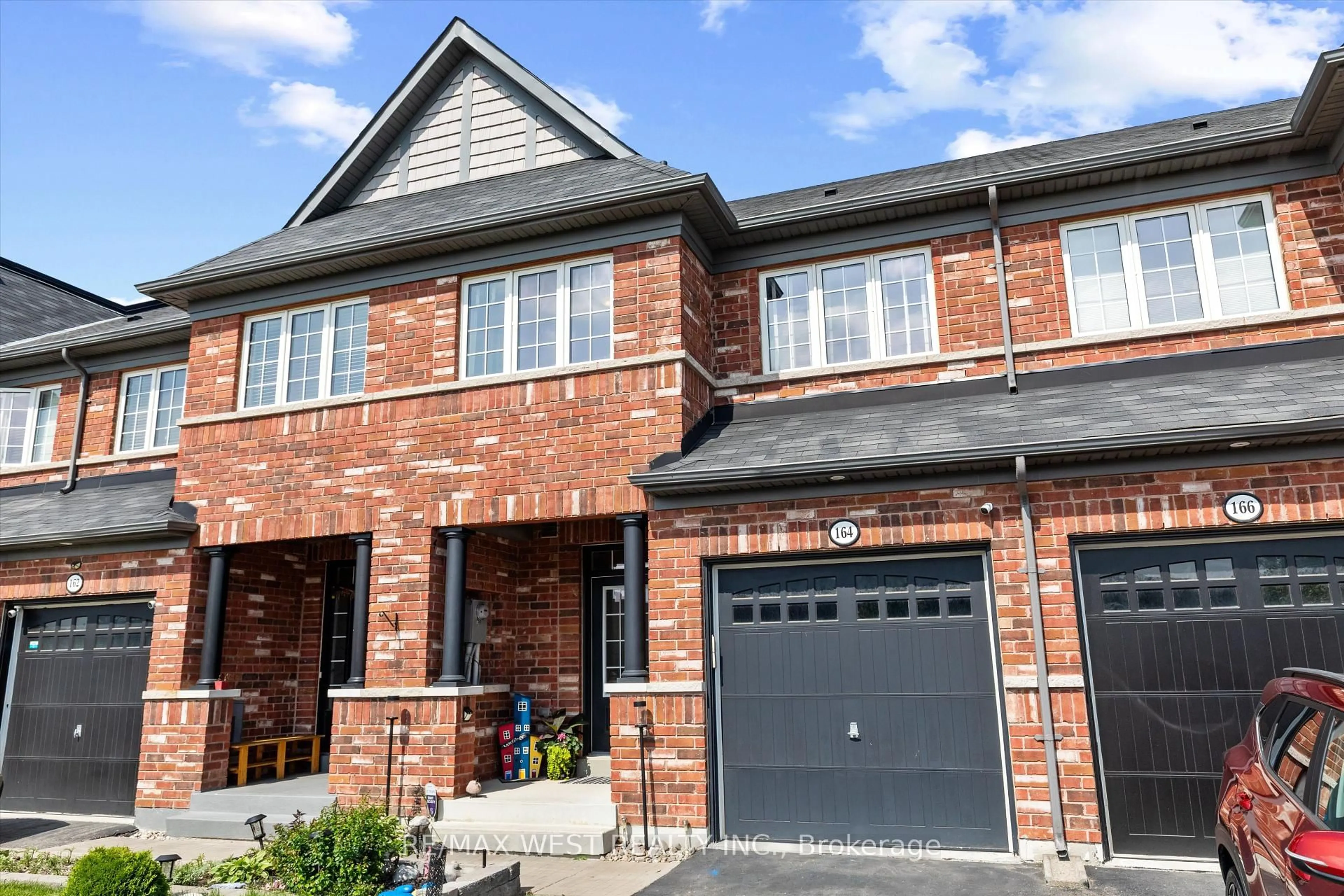 Home with brick exterior material, street for 164 Sussexvale Dr, Brampton Ontario L6R 3R2