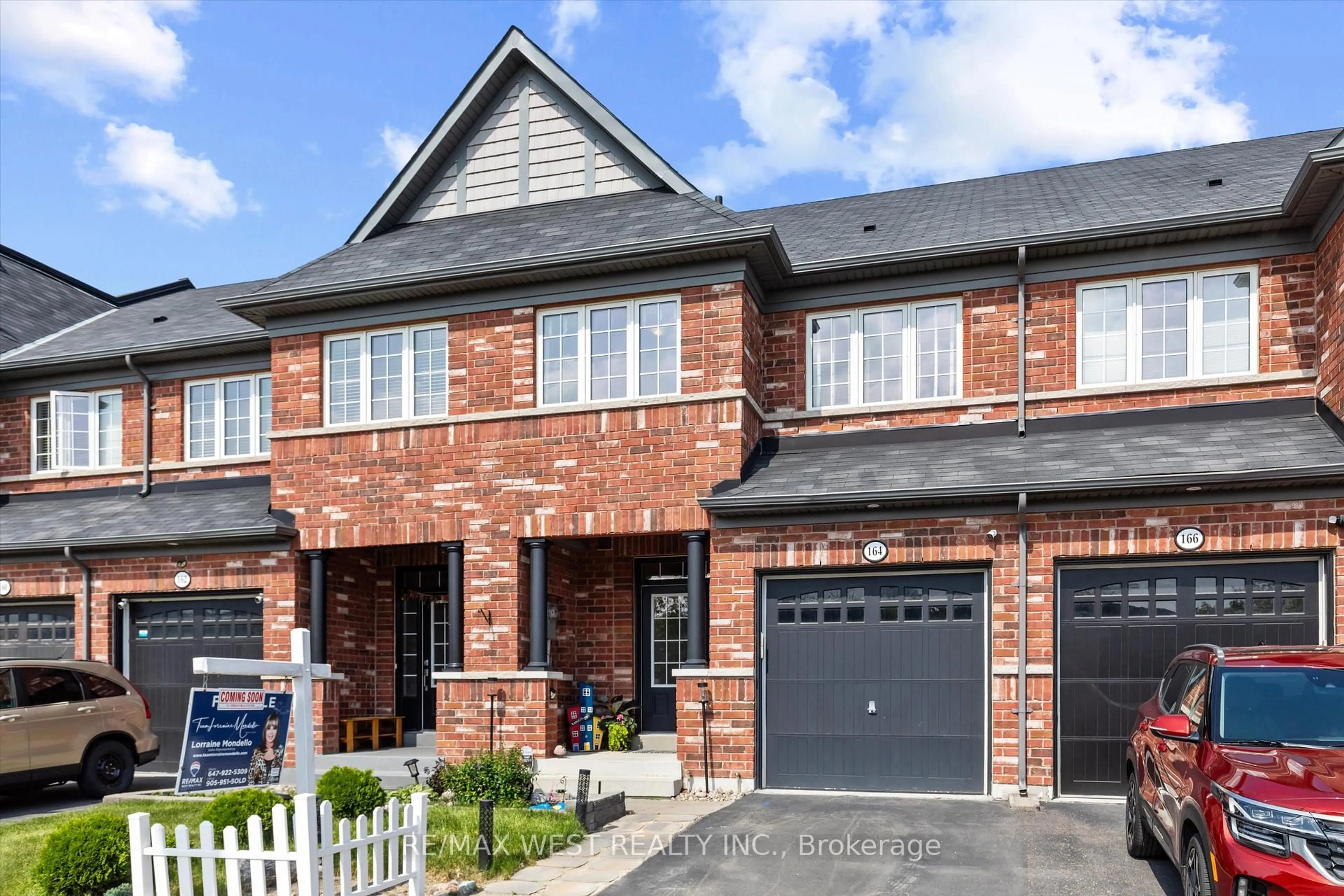 Home with brick exterior material, street for 164 Sussexvale Dr, Brampton Ontario L6R 3R2