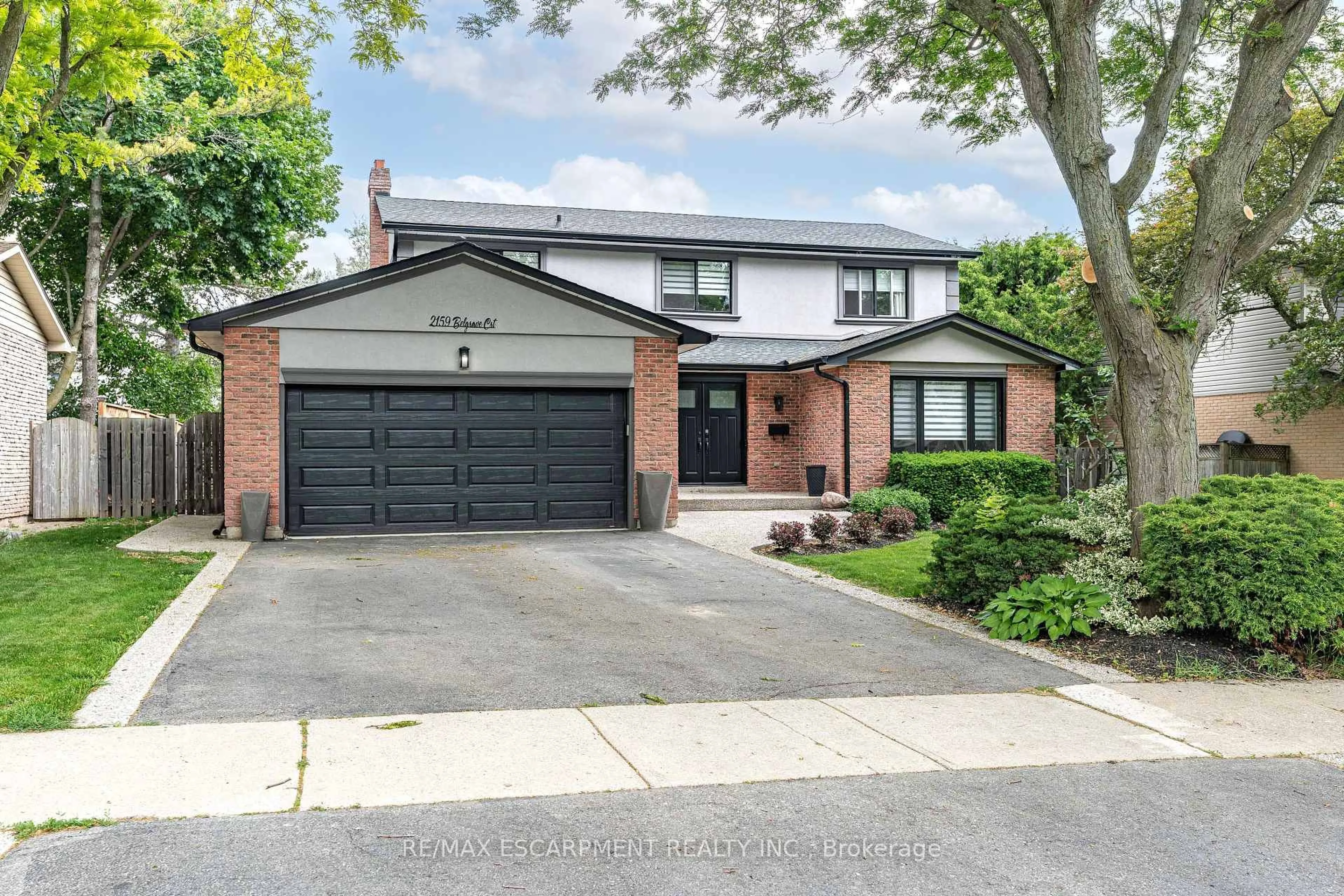 Home with brick exterior material, street for 2159 Belgrave Crt, Burlington Ontario L7P 3R5