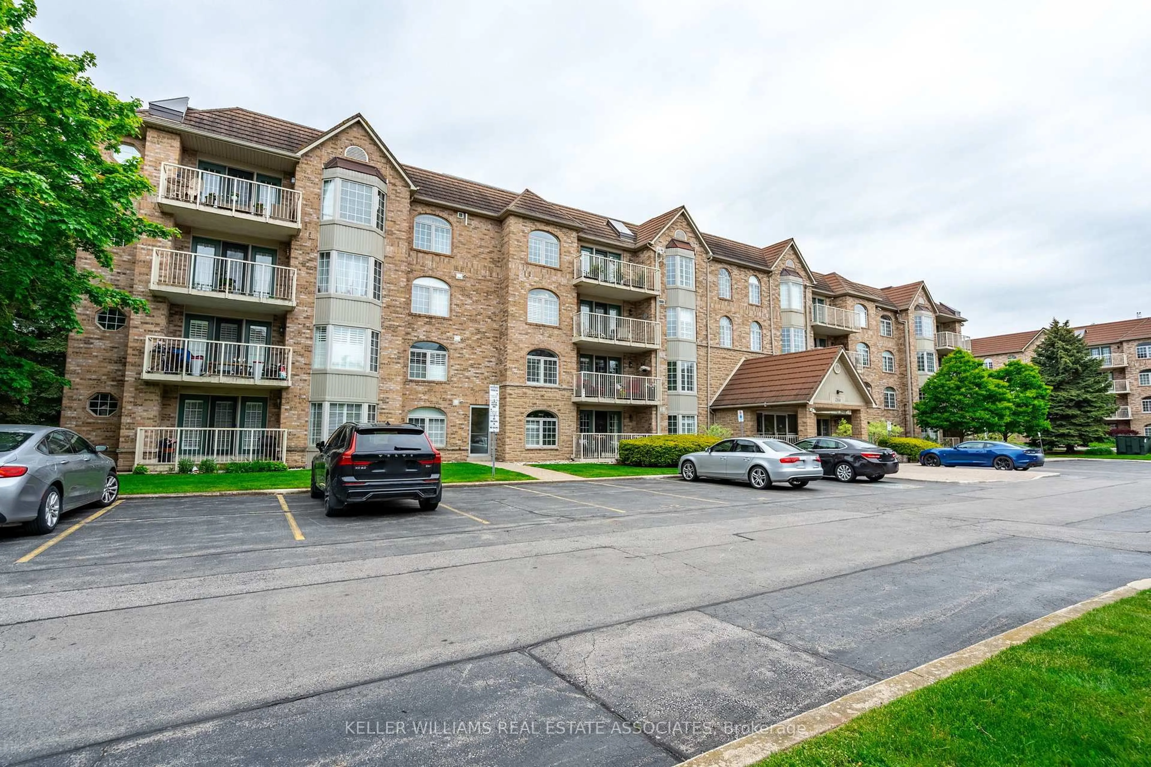 A pic from outside/outdoor area/front of a property/back of a property/a pic from drone, unknown for 216 Plains Rd #B208, Burlington Ontario L7T 4K9