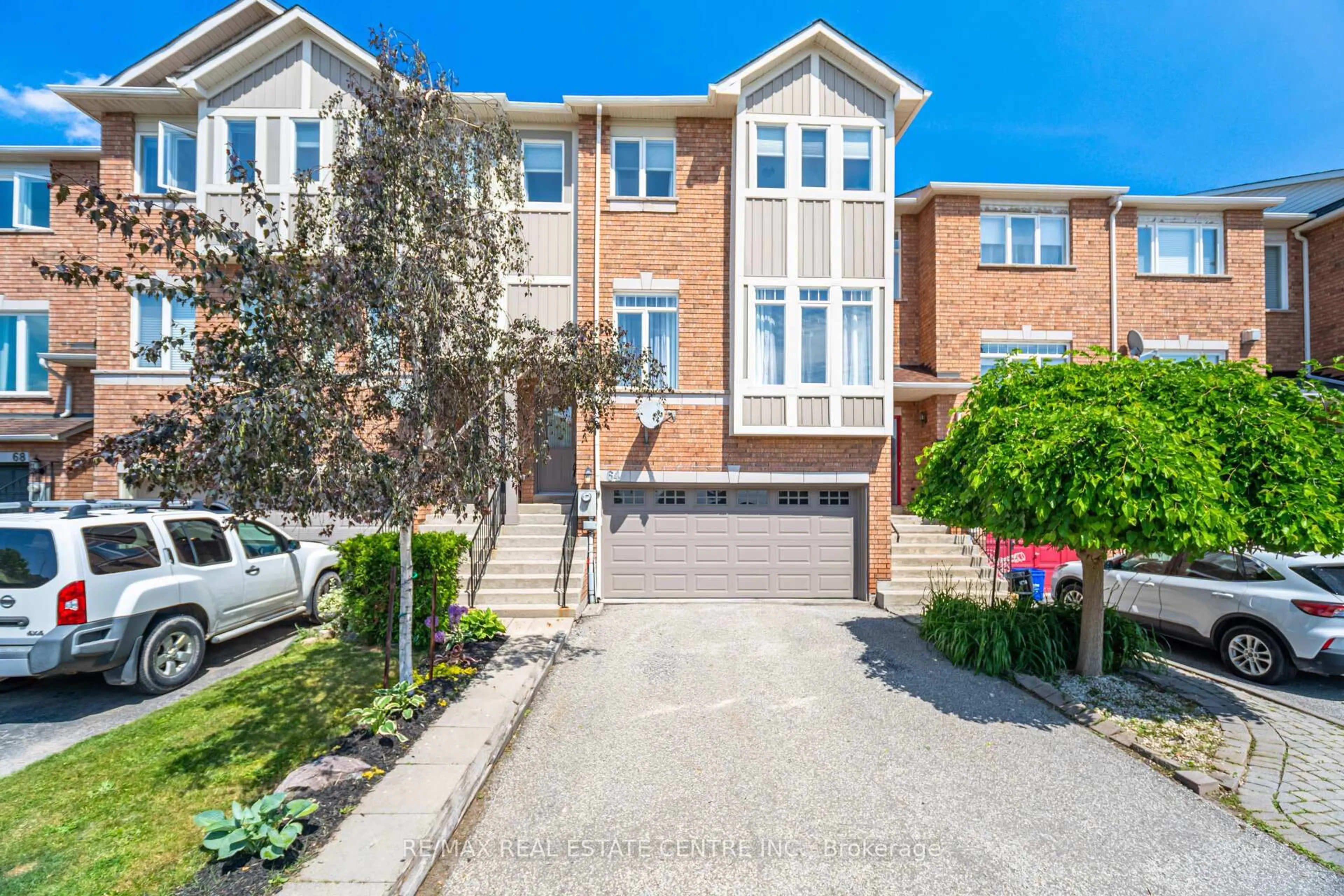 Home with brick exterior material, street for 64 Atwood Ave, Halton Hills Ontario L7G 6A1