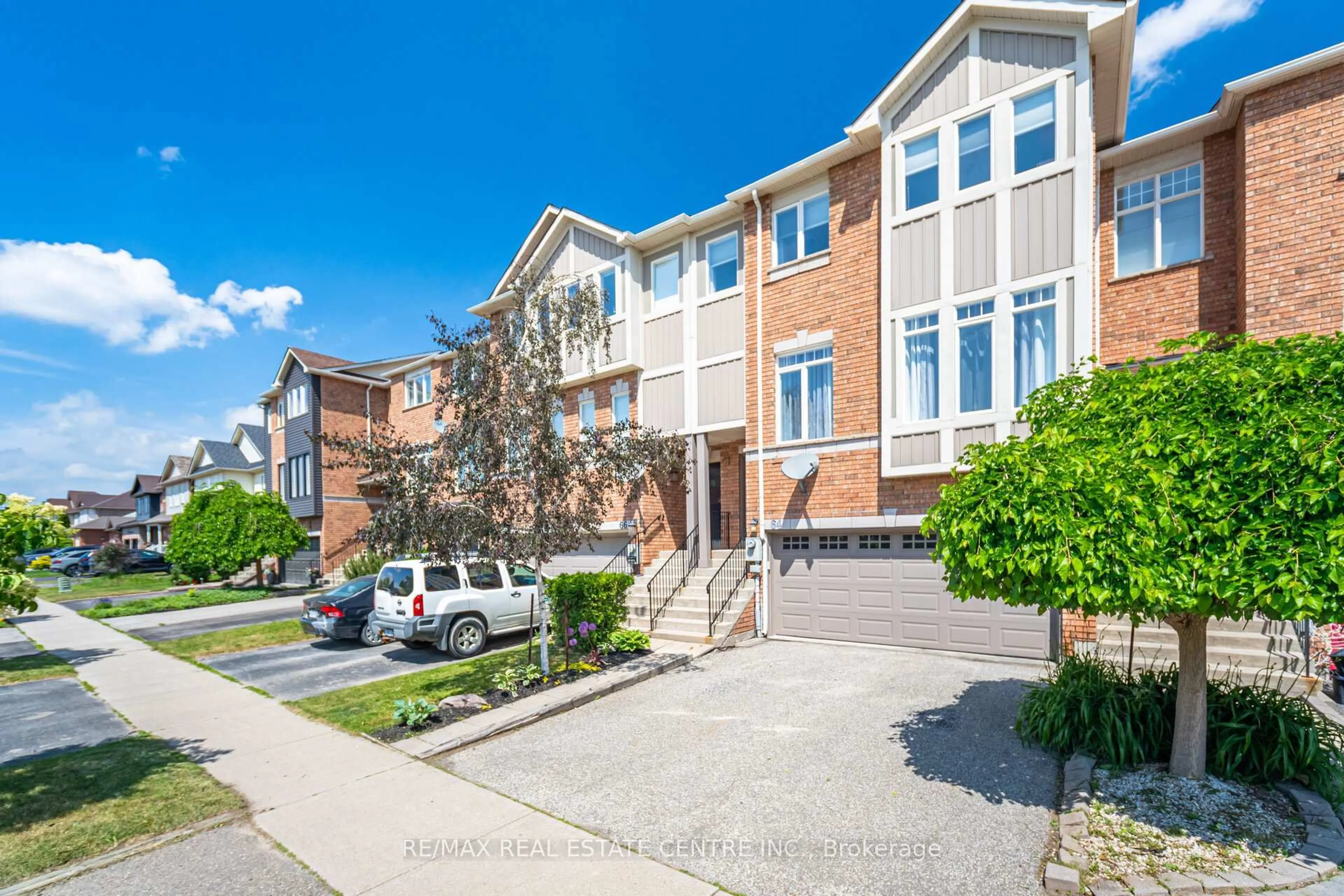 Home with brick exterior material, street for 64 Atwood Ave, Halton Hills Ontario L7G 6A1