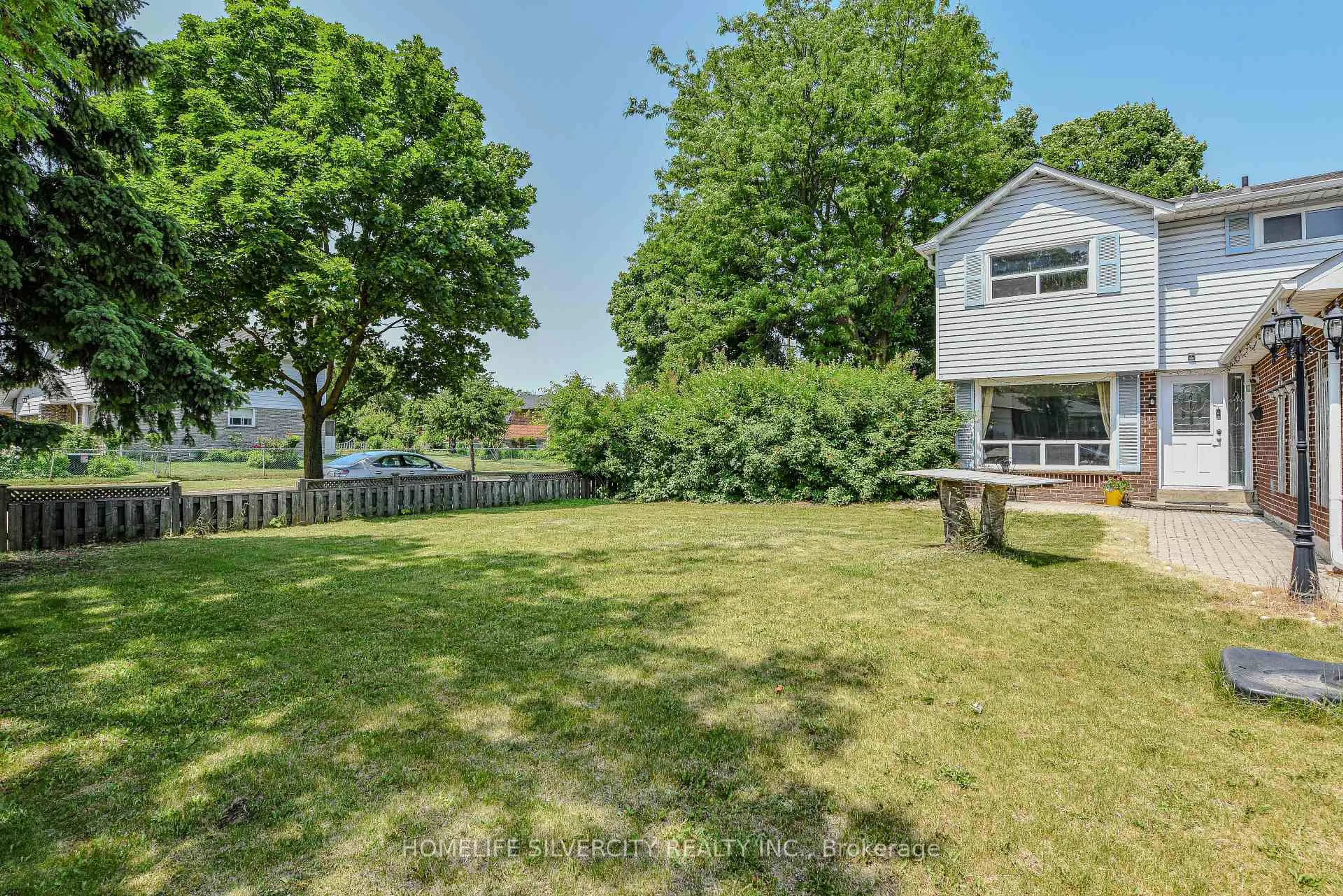 A pic from outside/outdoor area/front of a property/back of a property/a pic from drone, water/lake/river/ocean view for 7707 Netherwood Rd, Mississauga Ontario L4T 3H2