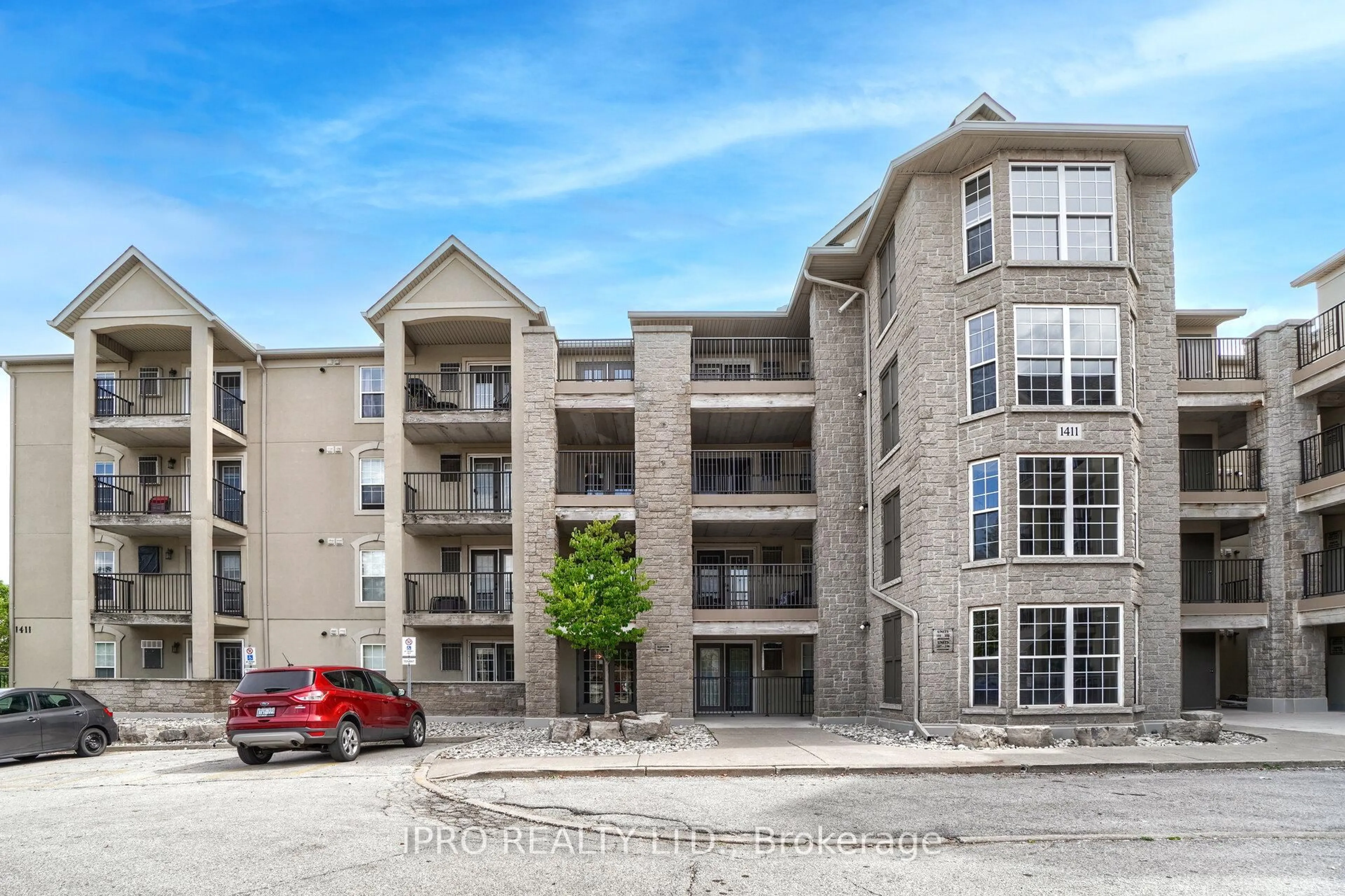 A pic from outside/outdoor area/front of a property/back of a property/a pic from drone, unknown for 1411 Walker's Line #406, Burlington Ontario L7M 4P5