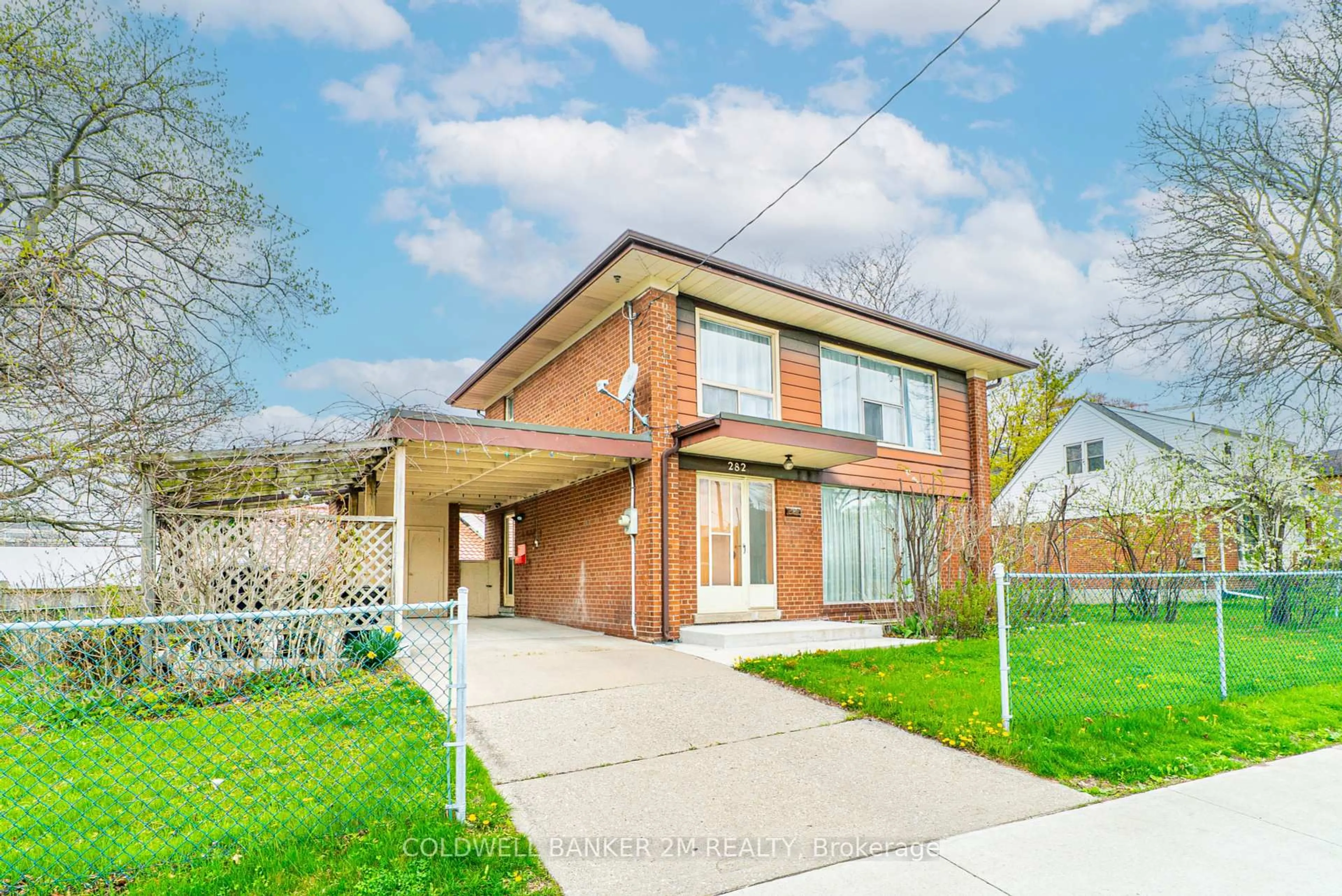 Home with brick exterior material, street for 282 The East Mall, Toronto Ontario M9B 3Z3