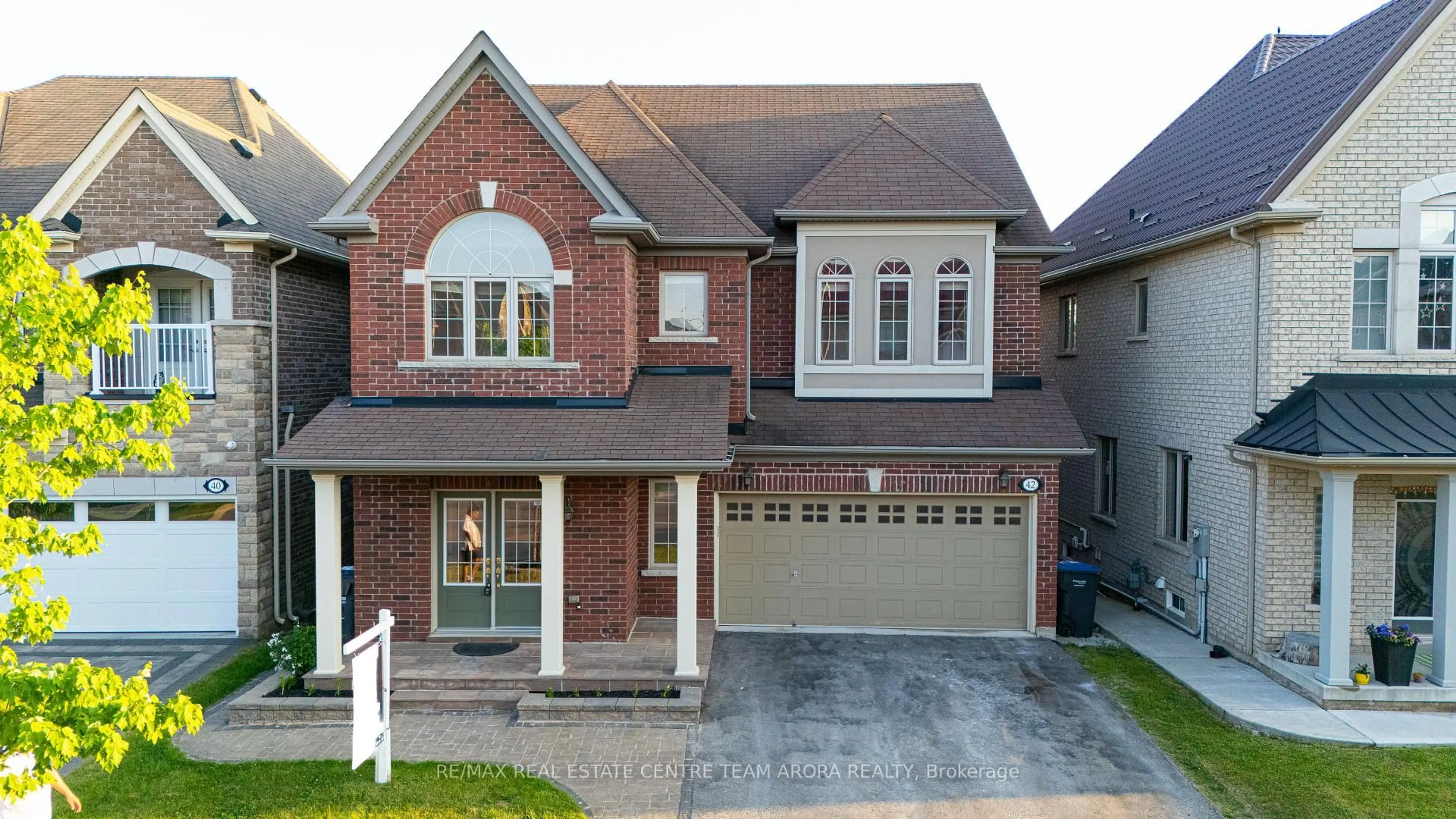 Home with brick exterior material, street for 42 Arrowpoint Dr, Brampton Ontario L6Y 0Y8