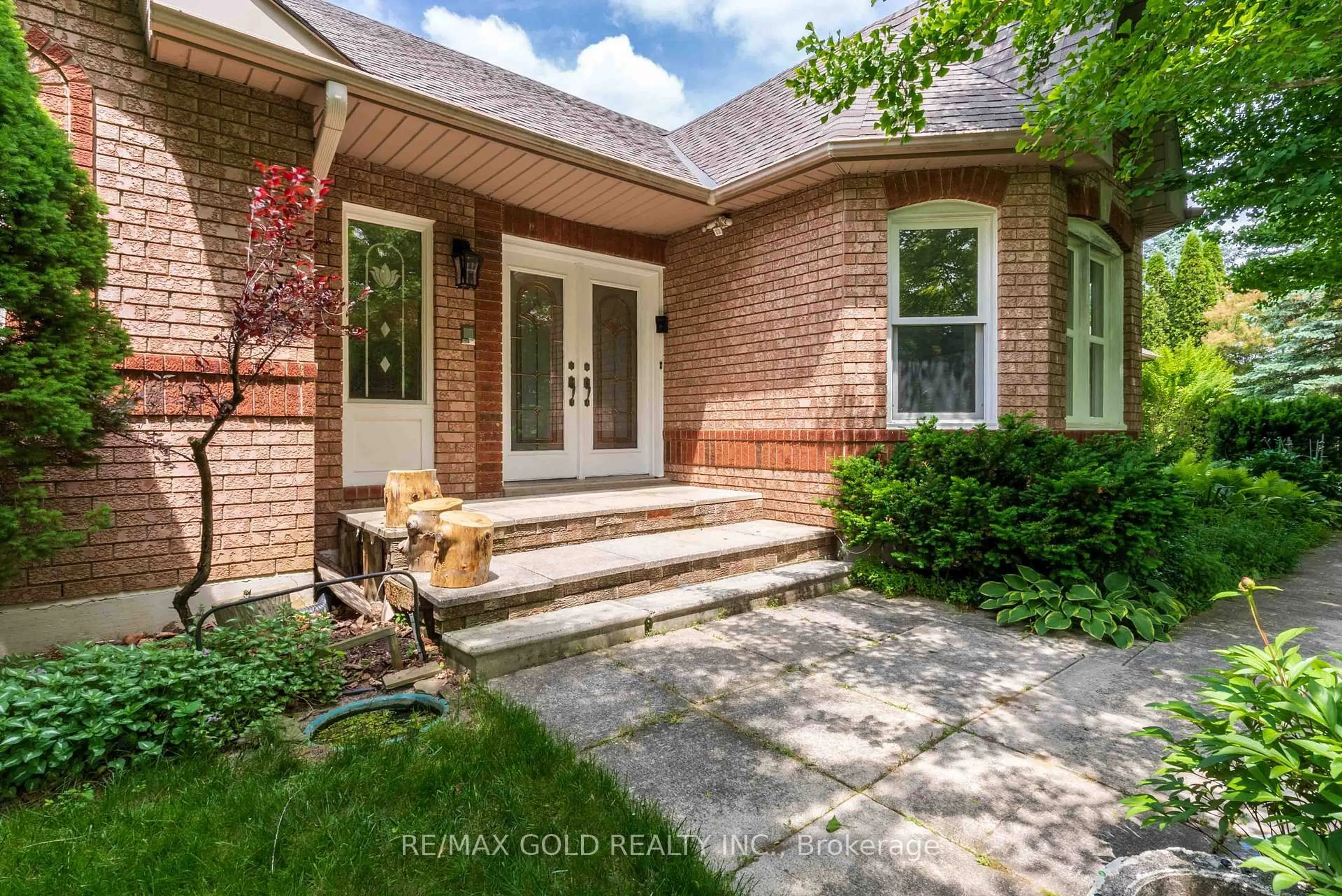 Home with brick exterior material, street for 12 Golfdale Crt, Caledon Ontario L7E 0B3