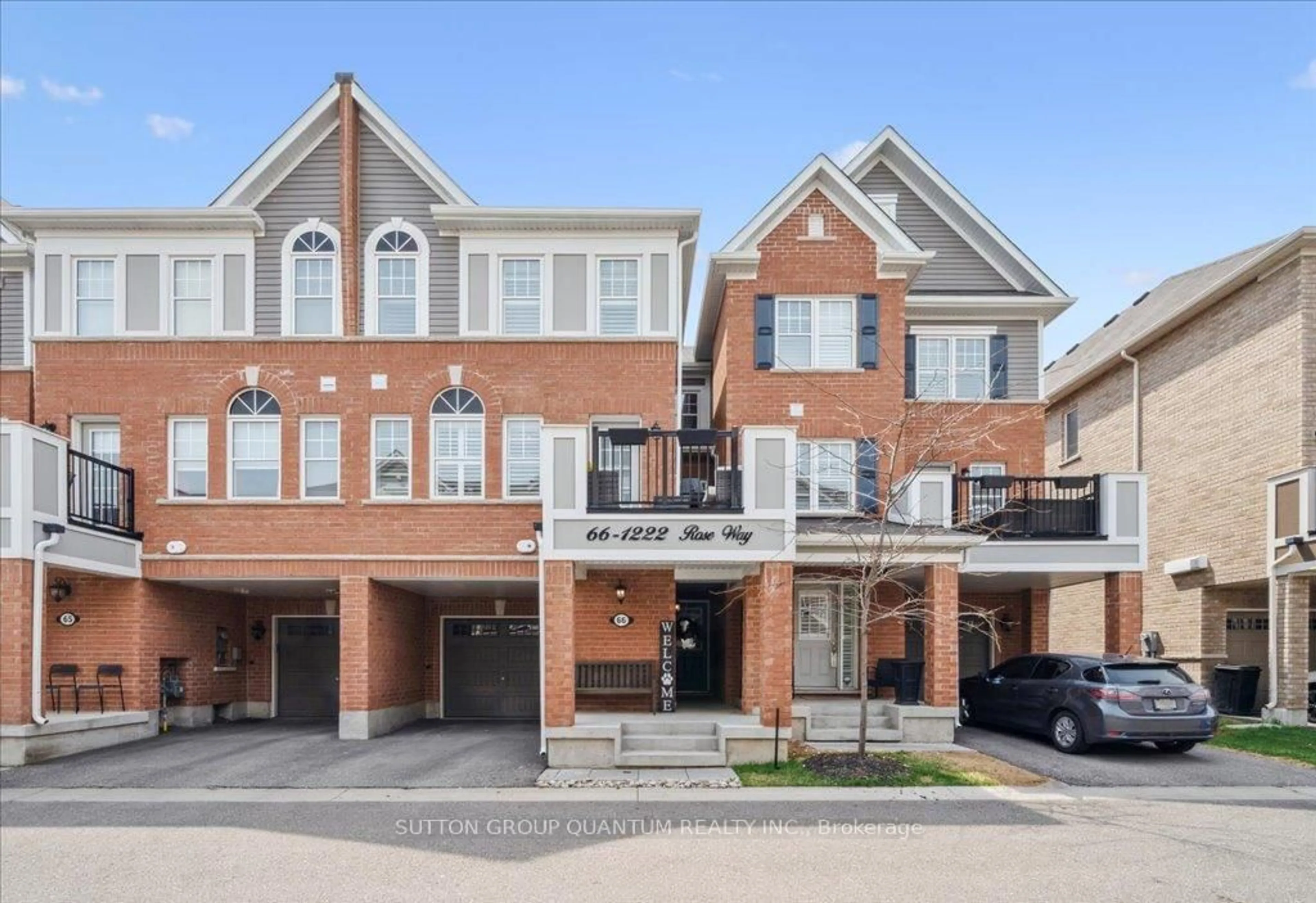 Home with brick exterior material, street for 1222 Rose Way #66, Milton Ontario L9E 1P2