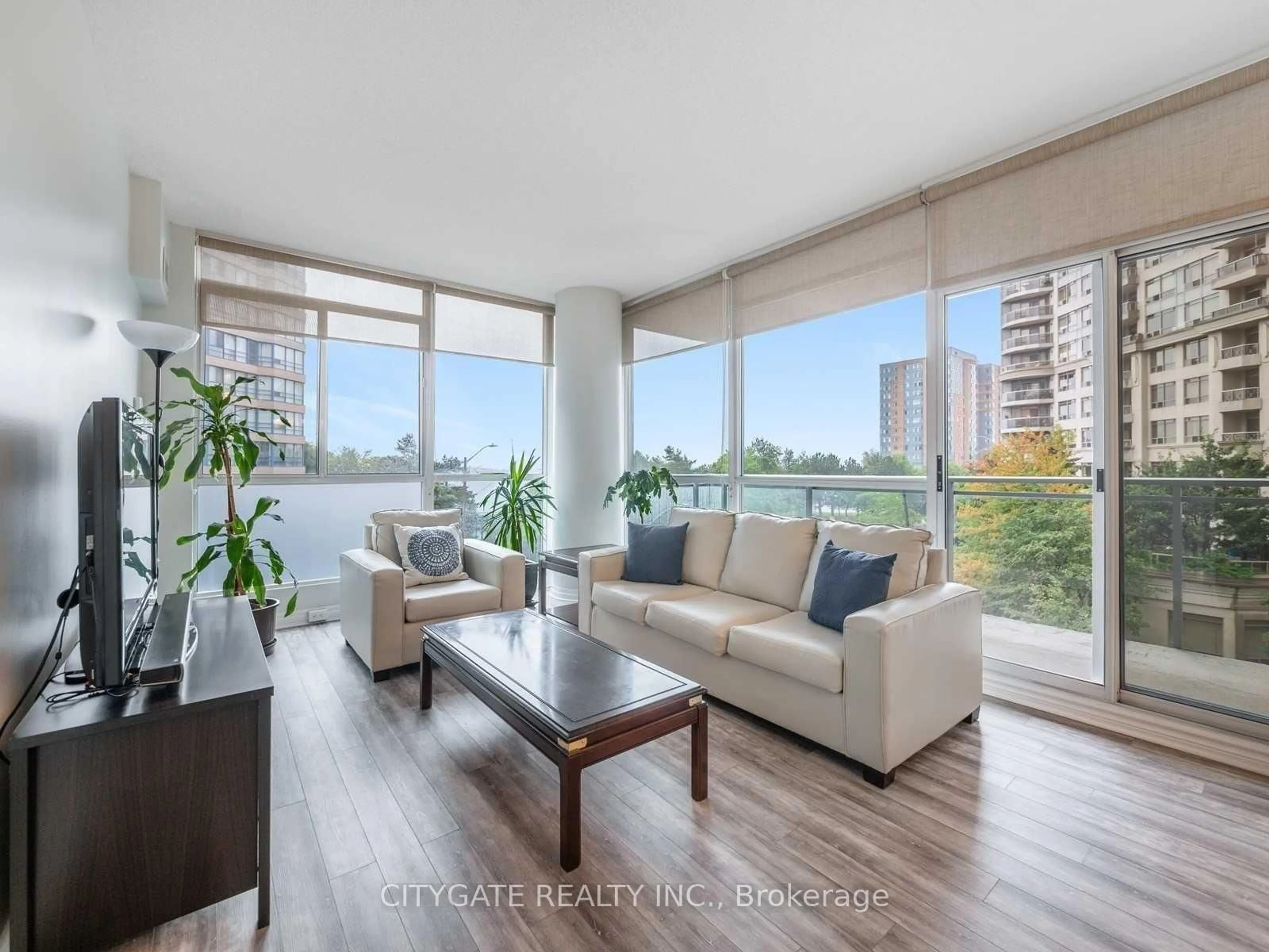Living room with furniture, unknown for 225 Webb Dr #314, Mississauga Ontario L5B 4P2