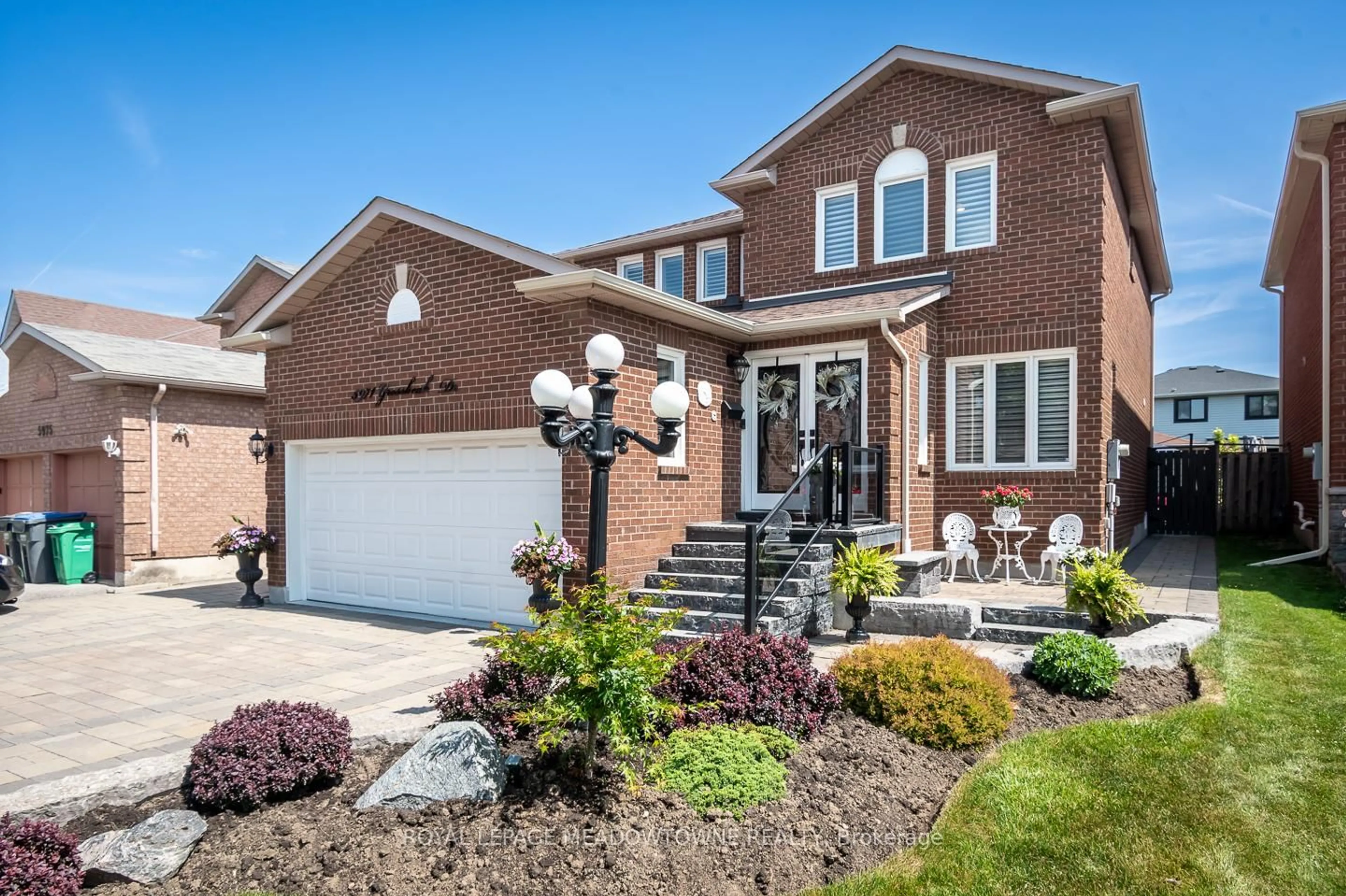 Home with brick exterior material, street for 5971 Grossbeak Dr, Mississauga Ontario L5N 6B3