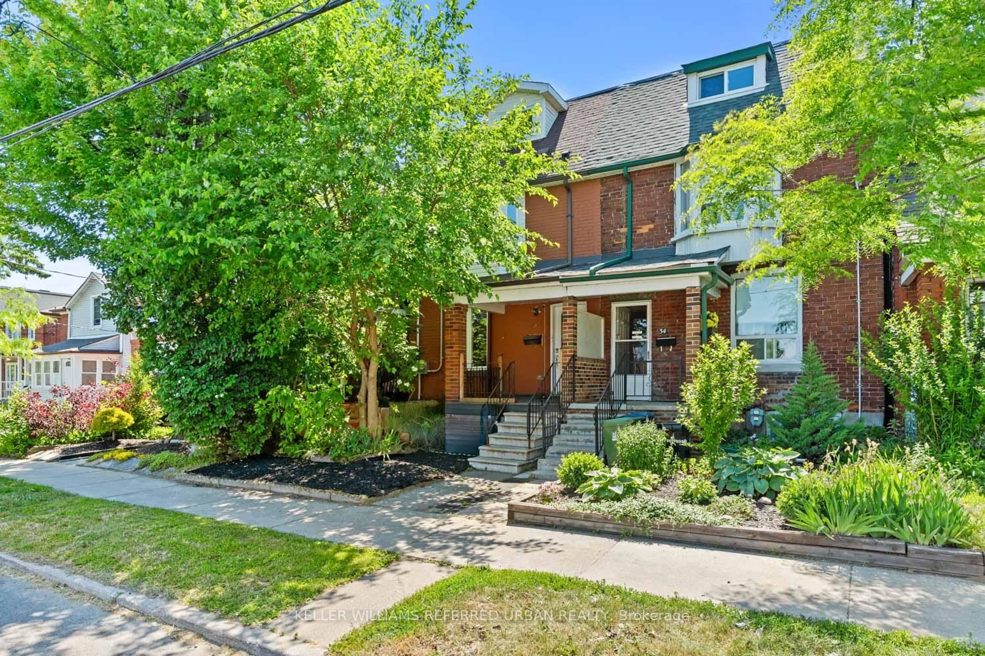 Home with brick exterior material, street for 32 Castleton Ave, Toronto Ontario M6N 3Z5